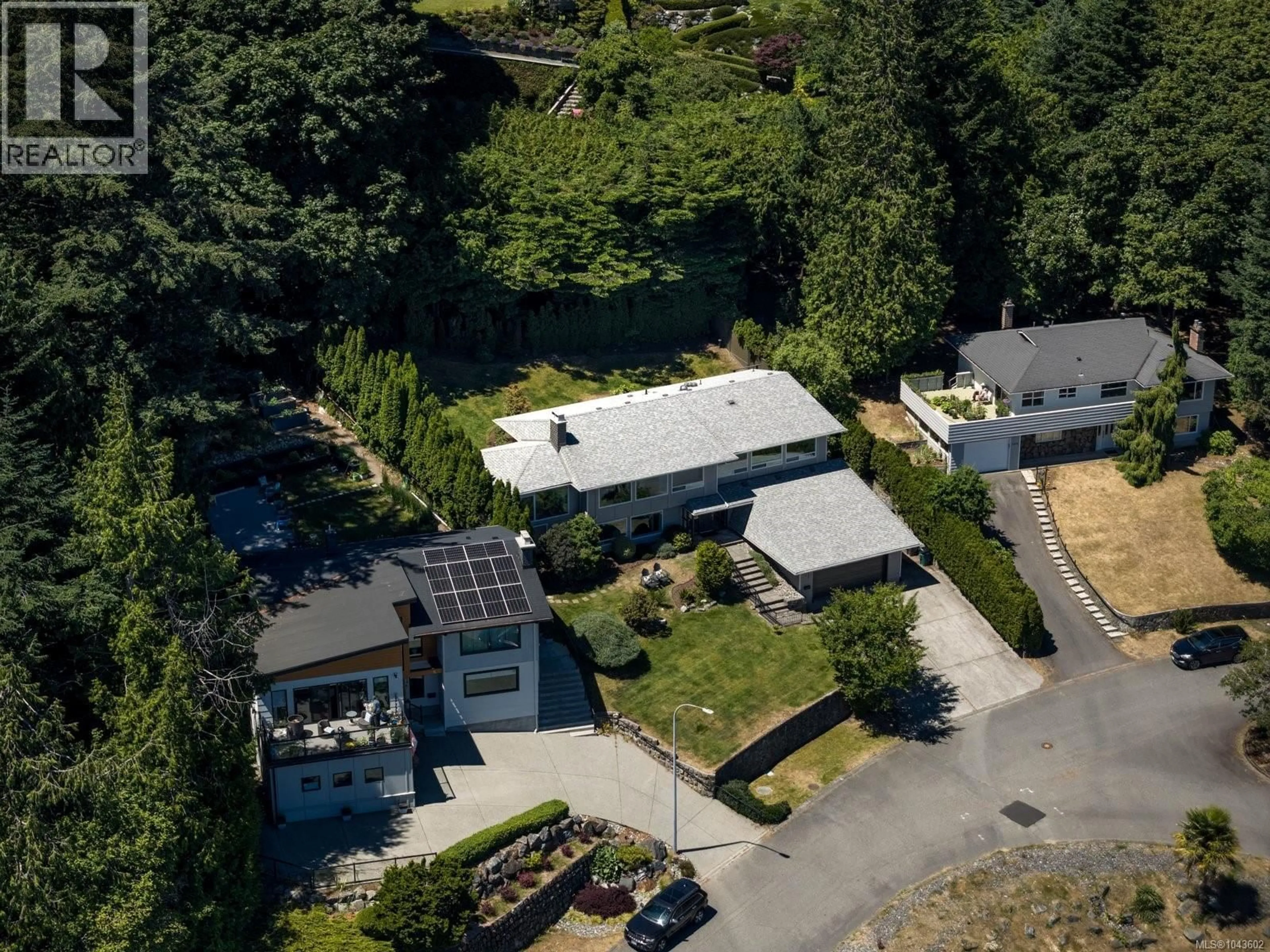 A pic from outside/outdoor area/front of a property/back of a property/a pic from drone, street for 5254 WESTOVER PLACE, Saanich British Columbia V8Y1P6