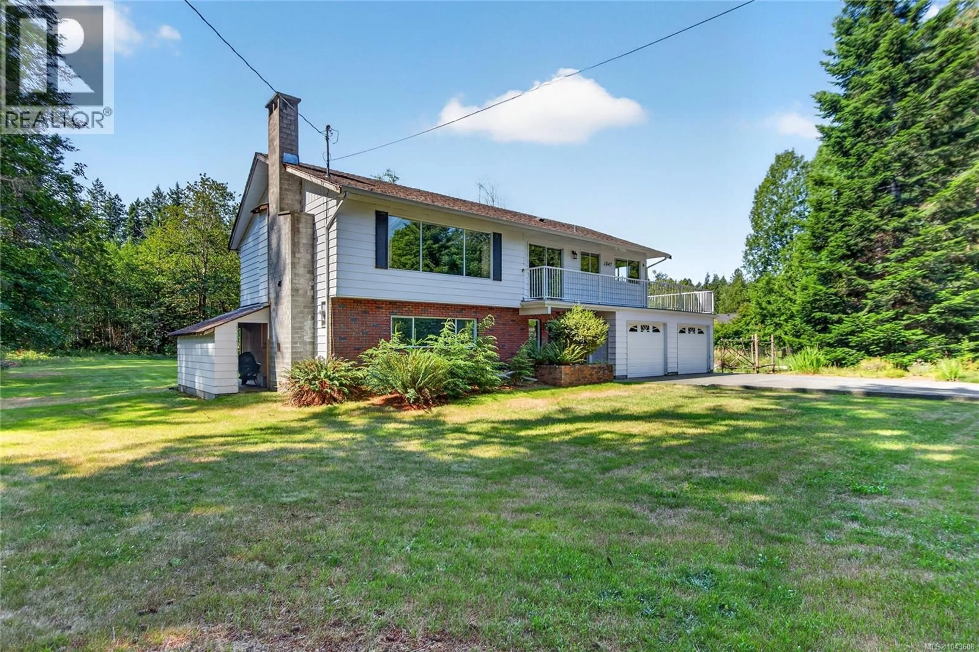 A pic from outside/outdoor area/front of a property/back of a property/a pic from drone, street for 1847 MIRACLE BEACH DRIVE, Black Creek British Columbia V9J1K1