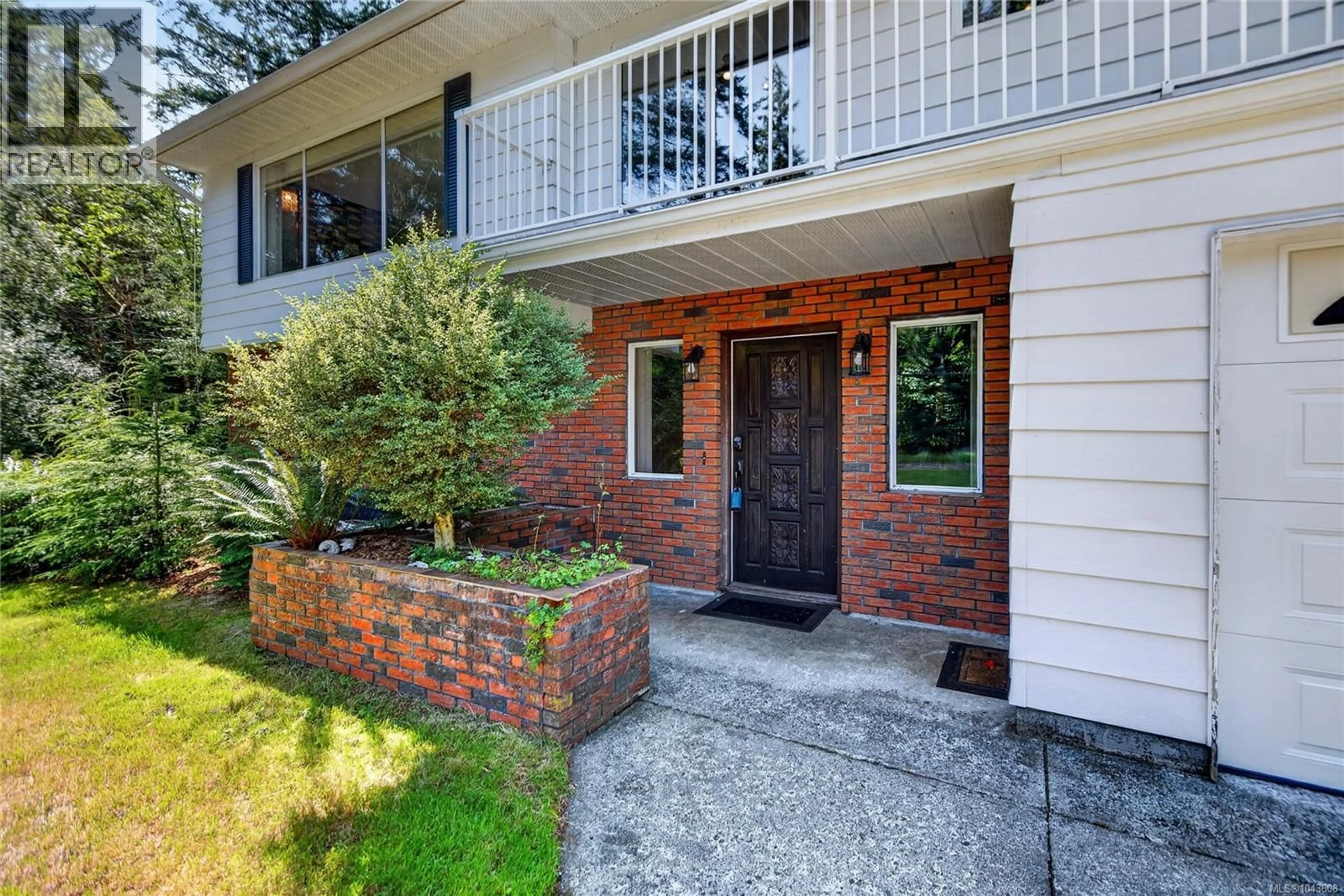 Home with brick exterior material, street for 1847 MIRACLE BEACH DRIVE, Black Creek British Columbia V9J1K1