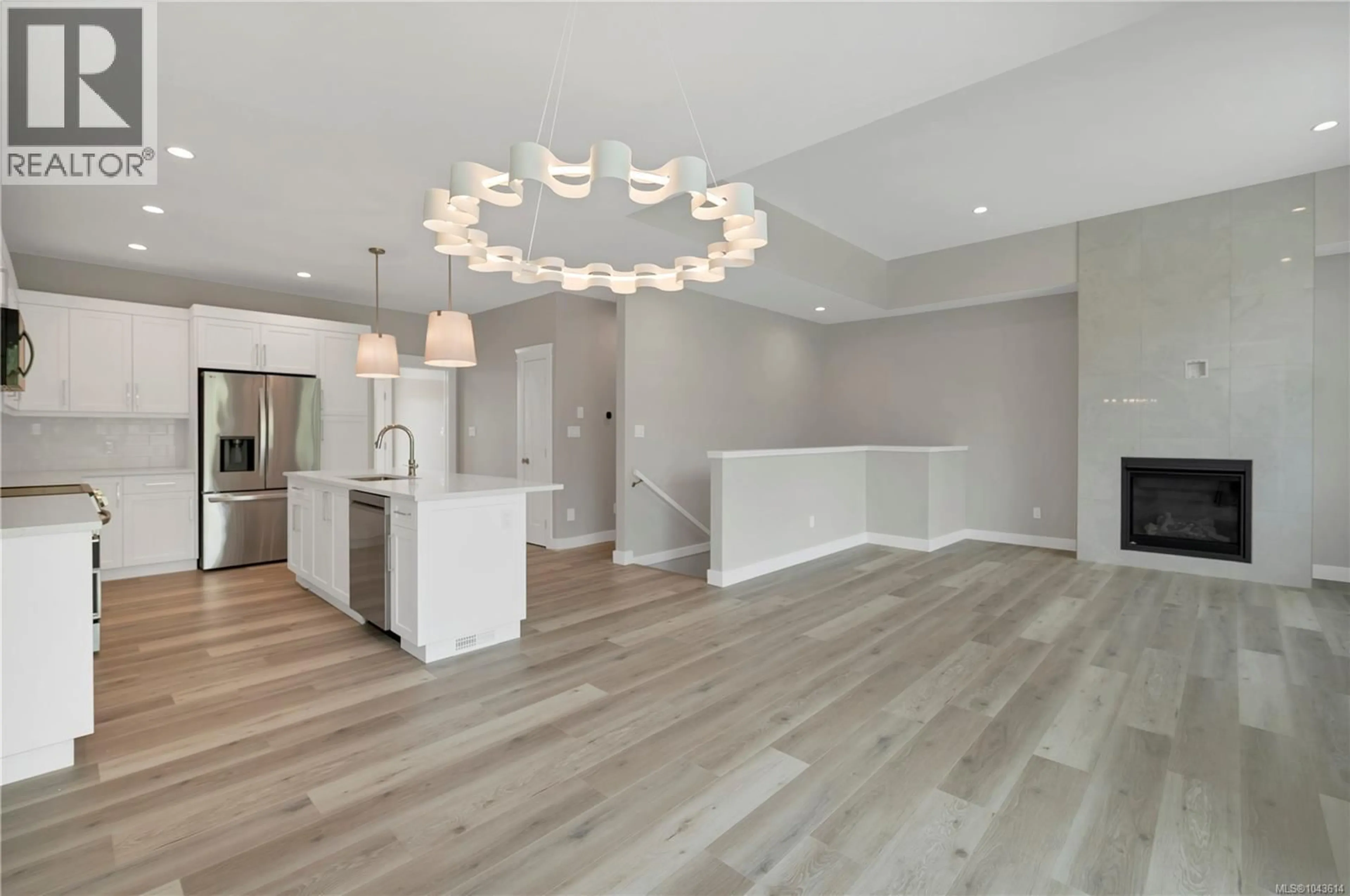 Open concept kitchen, wood/laminate floor for 241 WALWORTH ROAD SOUTH, Campbell River British Columbia V9W0J3
