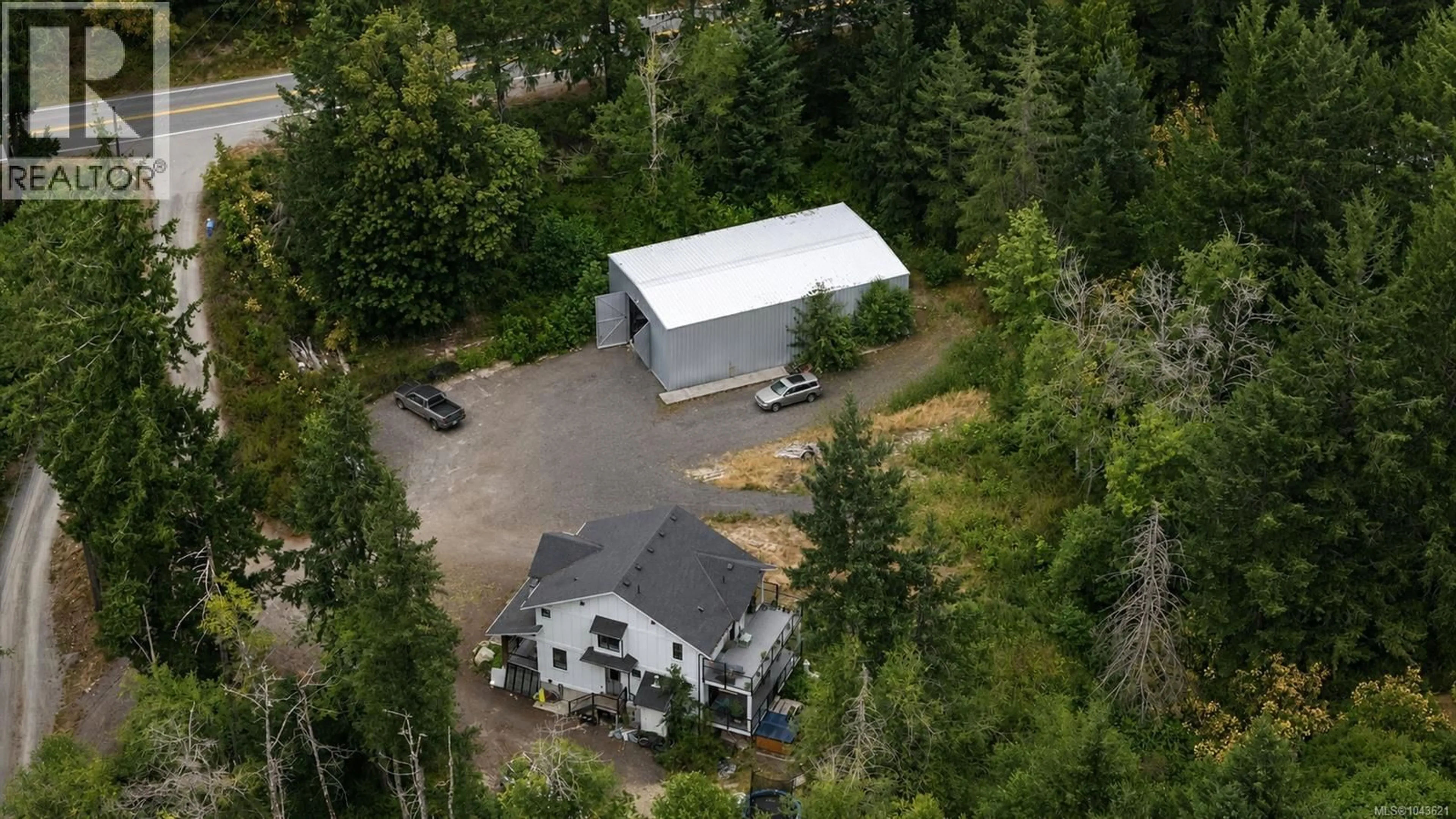 A pic from outside/outdoor area/front of a property/back of a property/a pic from drone, building for 682 SHAWNIGAN LAKE ROAD, Shawnigan Lake British Columbia V0R2L0