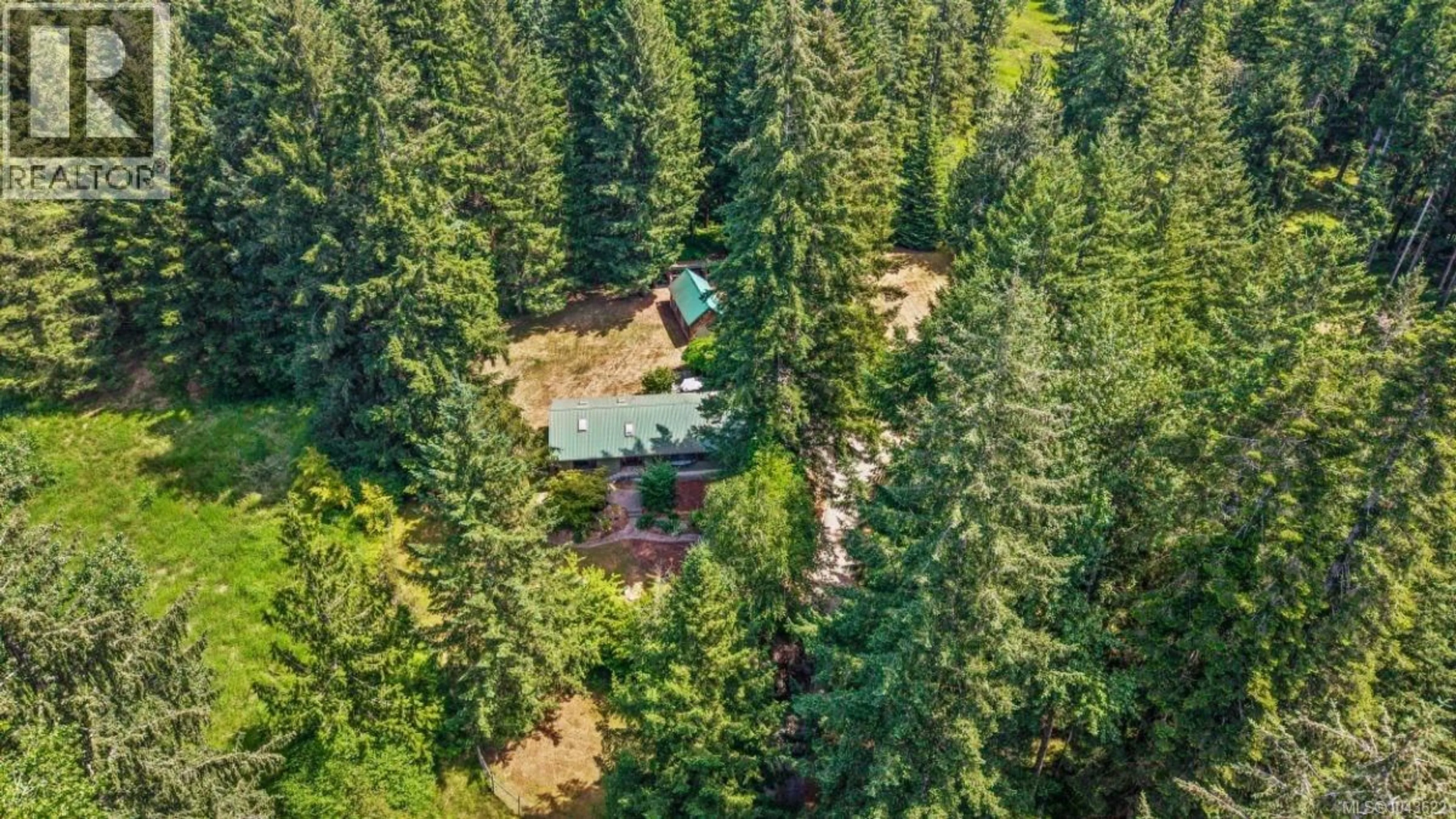 A pic from outside/outdoor area/front of a property/back of a property/a pic from drone, forest/trees view for 6004 NELSON ROAD, Courtenay British Columbia V9J1N9