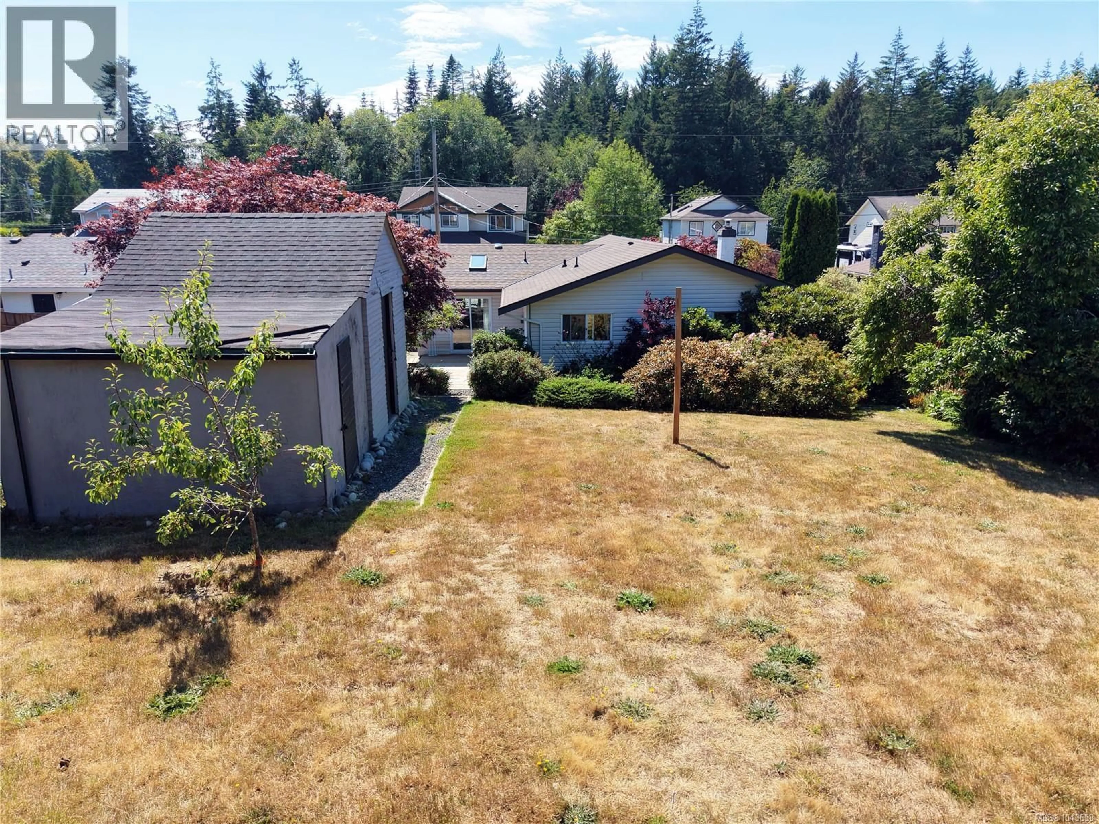 A pic from outside/outdoor area/front of a property/back of a property/a pic from drone, mountain view for 1763 MARATHON LANE, Sooke British Columbia V9Z0S5