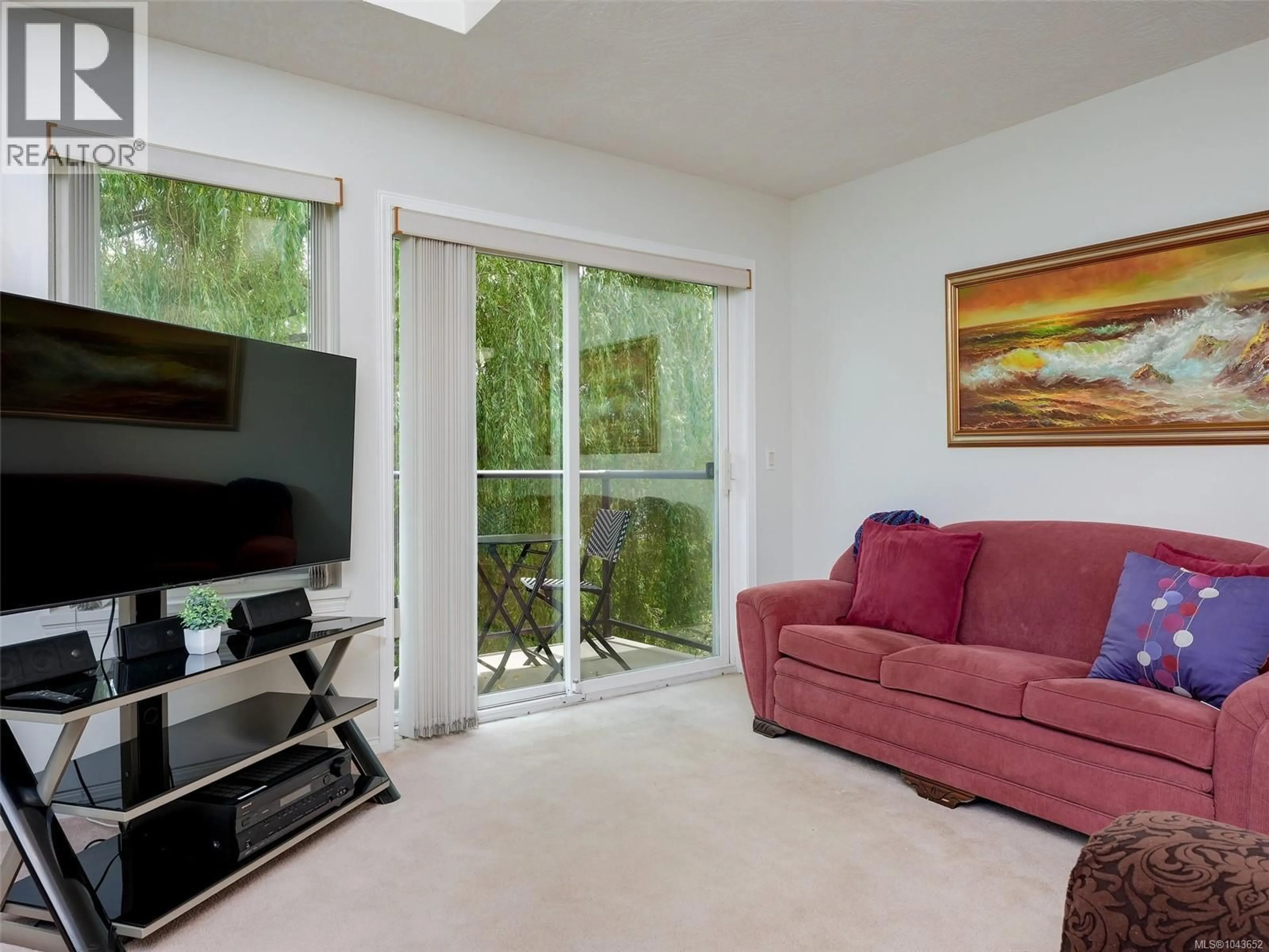 Living room with furniture, unknown for 304 - 1485 GARNET ROAD, Saanich British Columbia V8P5T5
