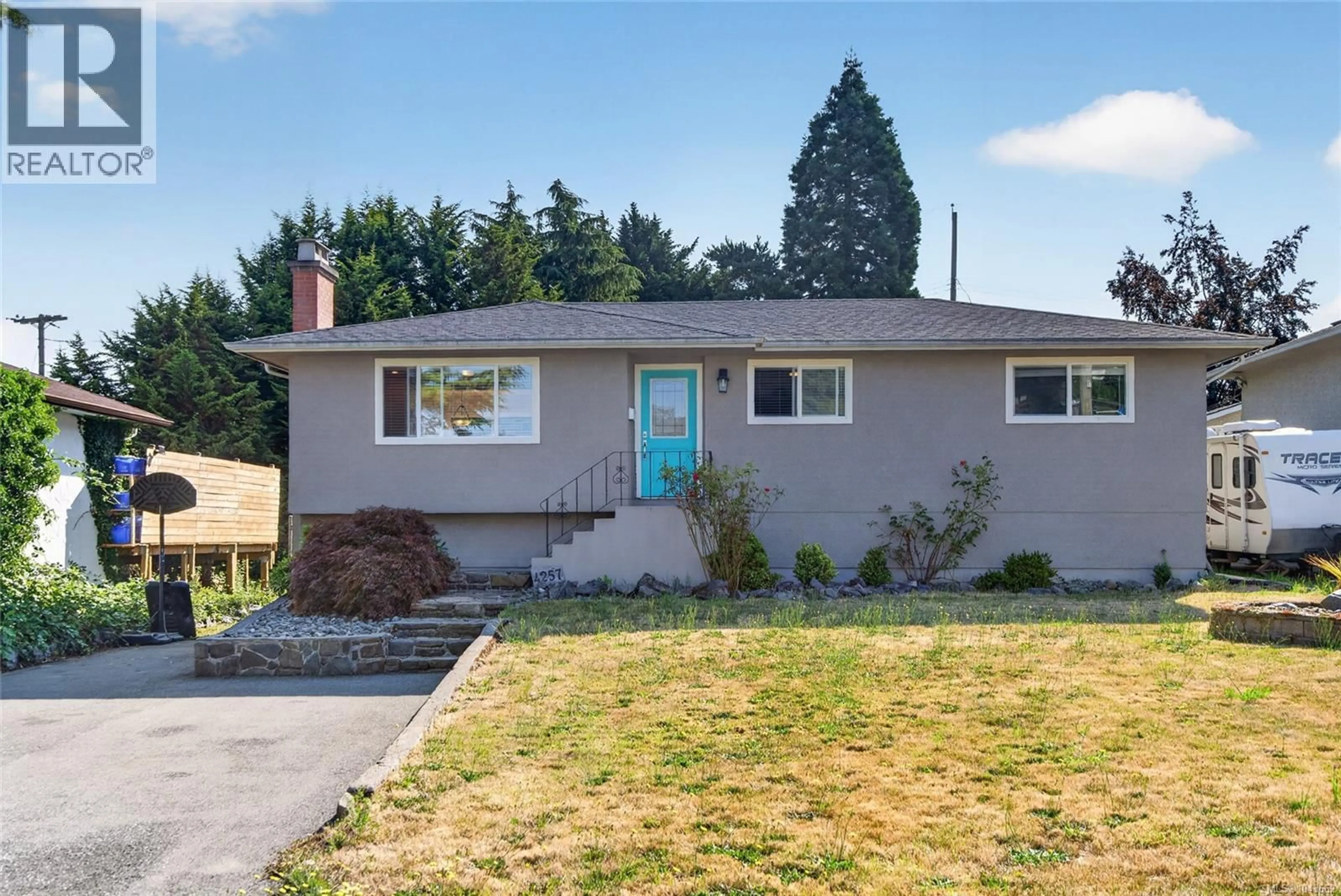 Home with vinyl exterior material, street for 4257 CAREY ROAD, Saanich British Columbia V8Z4H1