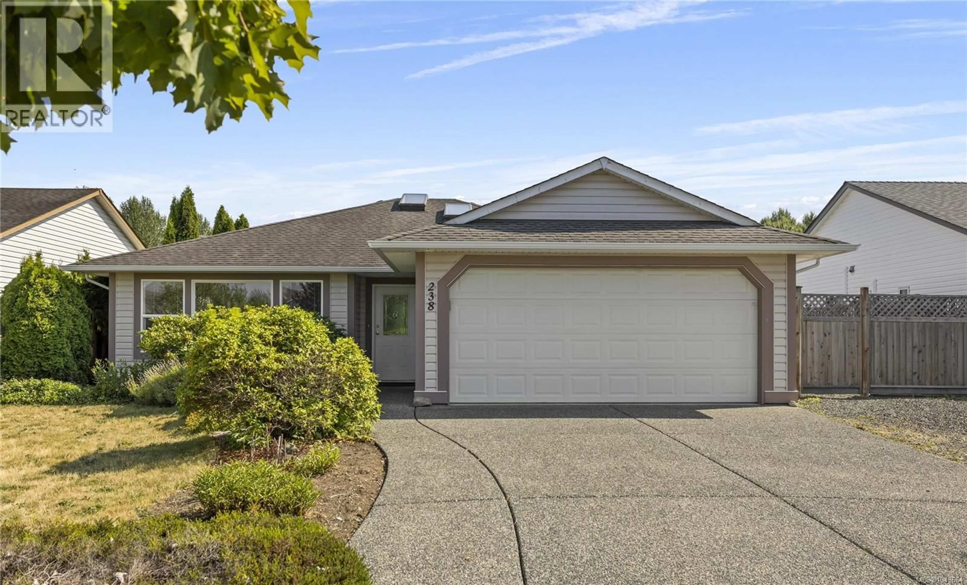 Home with vinyl exterior material, street for 238 STRAWBERRY CRESCENT, Parksville British Columbia V9P2W7