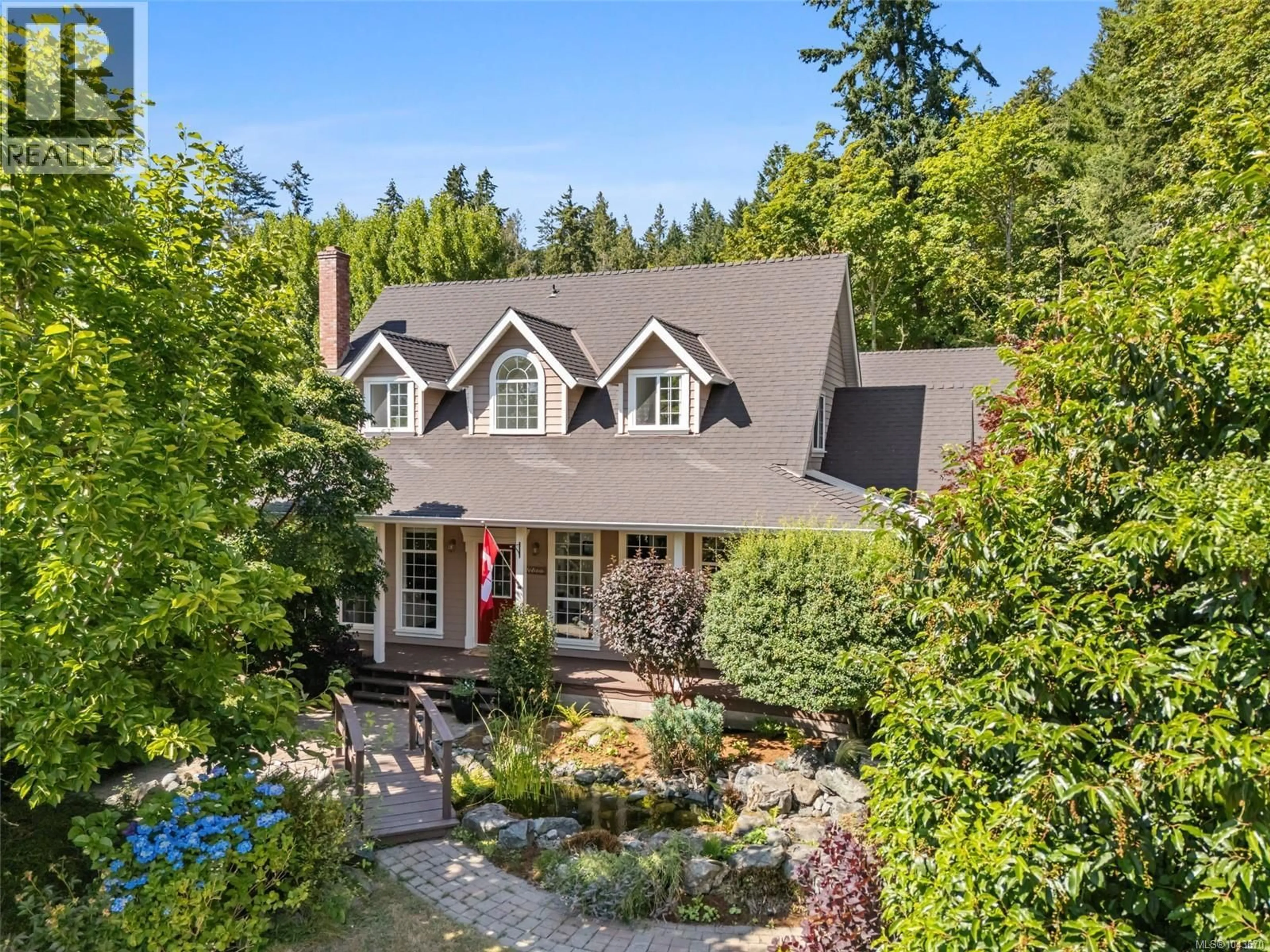 A pic from outside/outdoor area/front of a property/back of a property/a pic from drone, water/lake/river/ocean view for 1130 TATLOW ROAD, North Saanich British Columbia V8L5P3