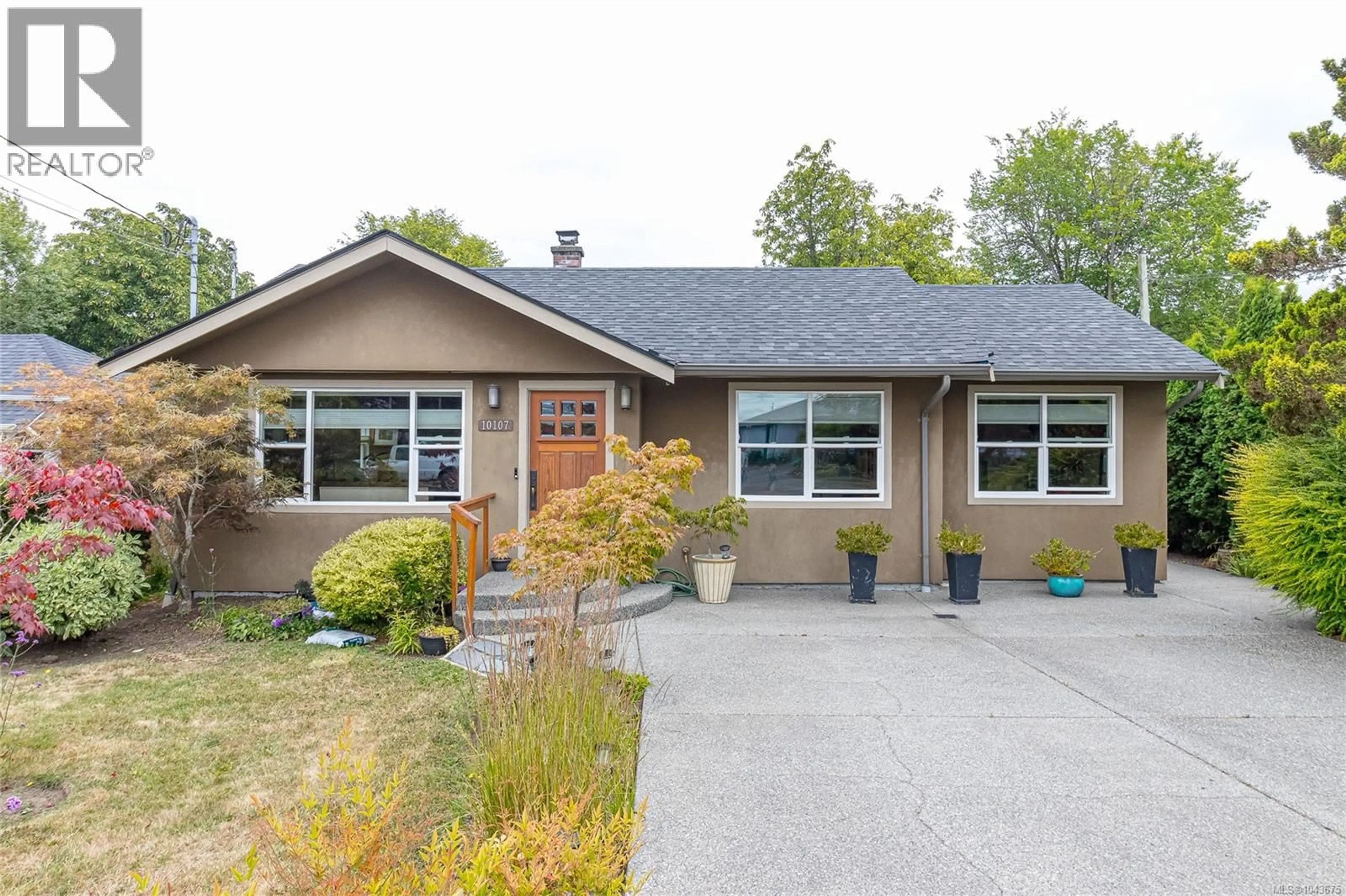 Home with vinyl exterior material, street for 10107 THIRD STREET, Sidney British Columbia V8L3B4