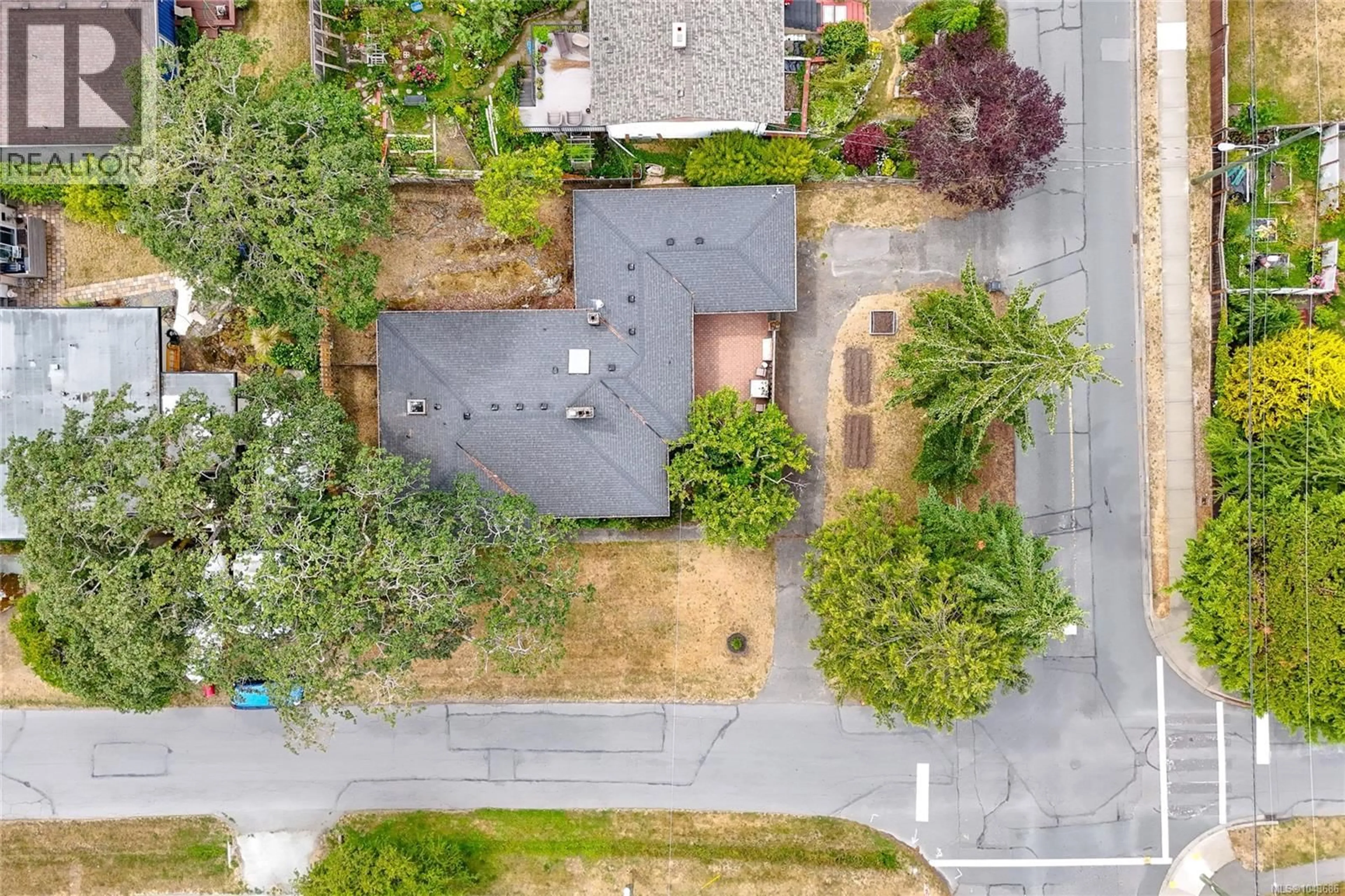 A pic from outside/outdoor area/front of a property/back of a property/a pic from drone, street for 3830 PALO ALTO STREET, Saanich British Columbia V8P4S3