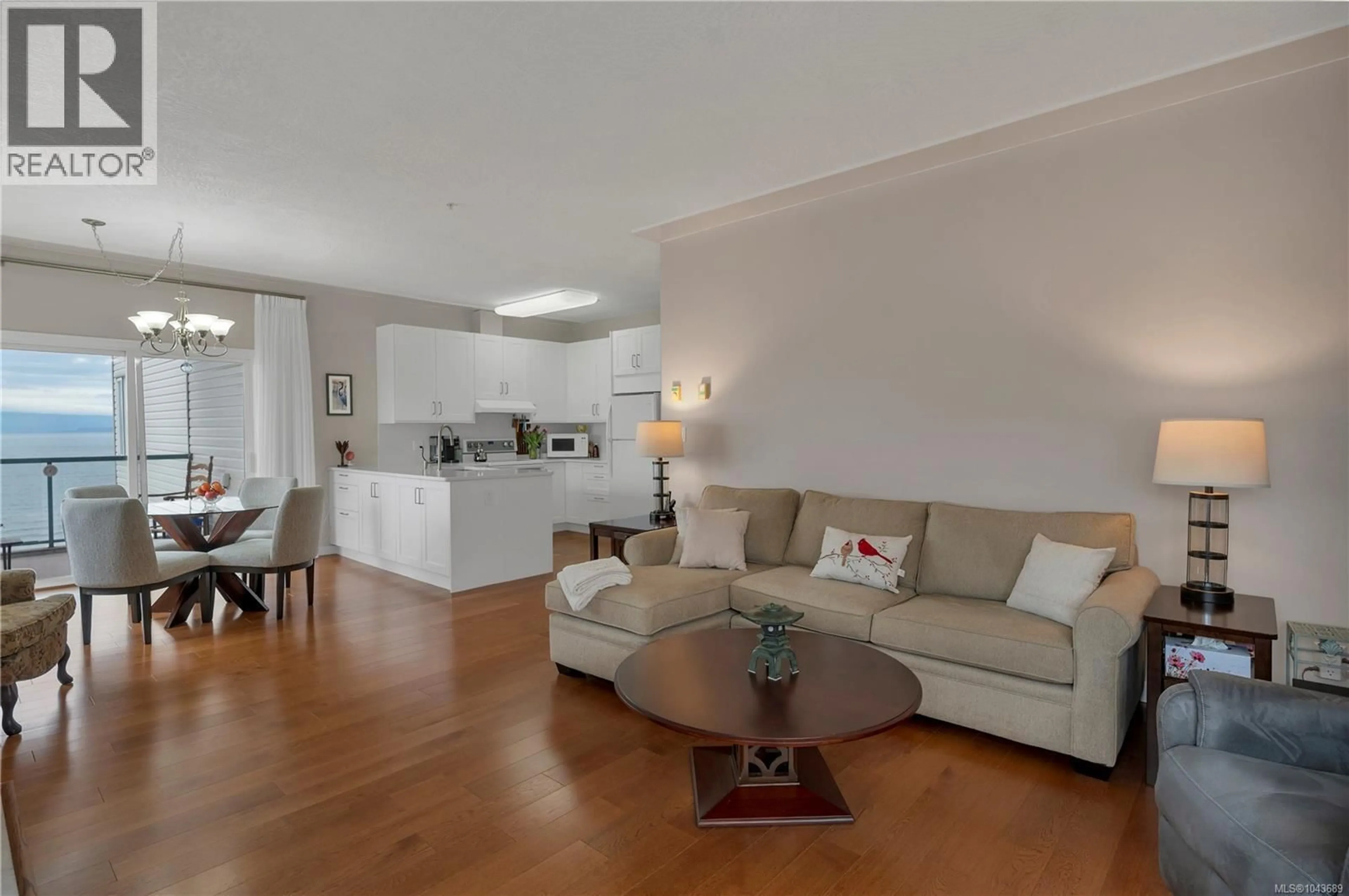 Living room with furniture, wood/laminate floor for 308 - 1350 ISLAND HIGHWAY SOUTH, Campbell River British Columbia V9W1B7