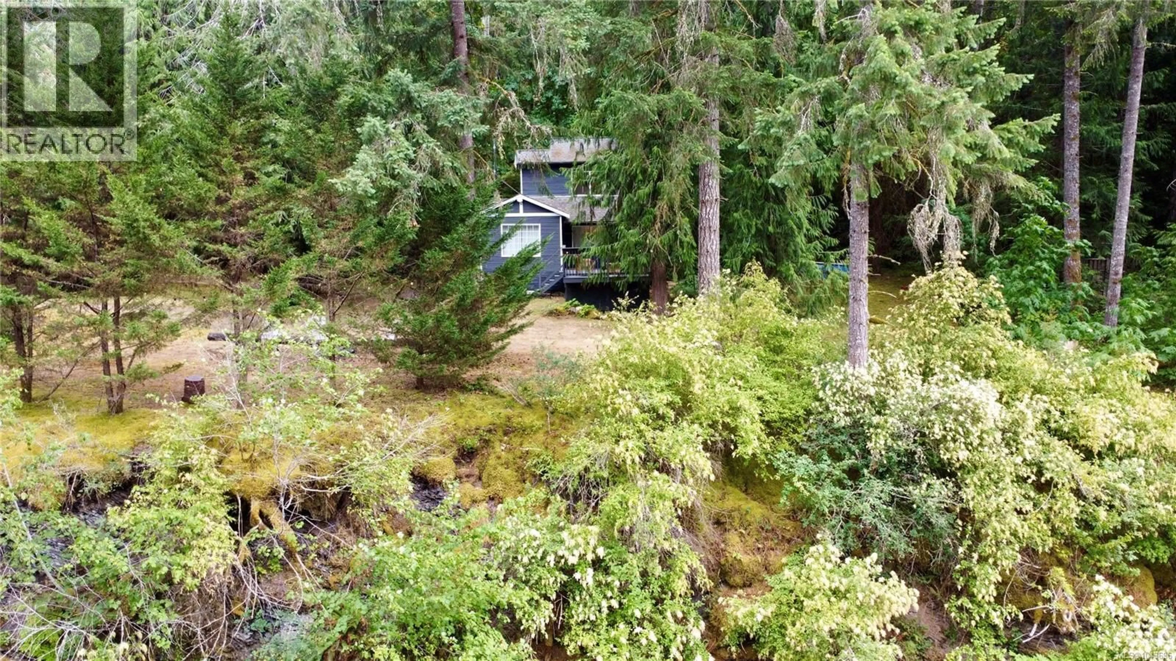 A pic from outside/outdoor area/front of a property/back of a property/a pic from drone, forest/trees view for 4021 JOHN'S ROAD, Duncan British Columbia V9L6S7