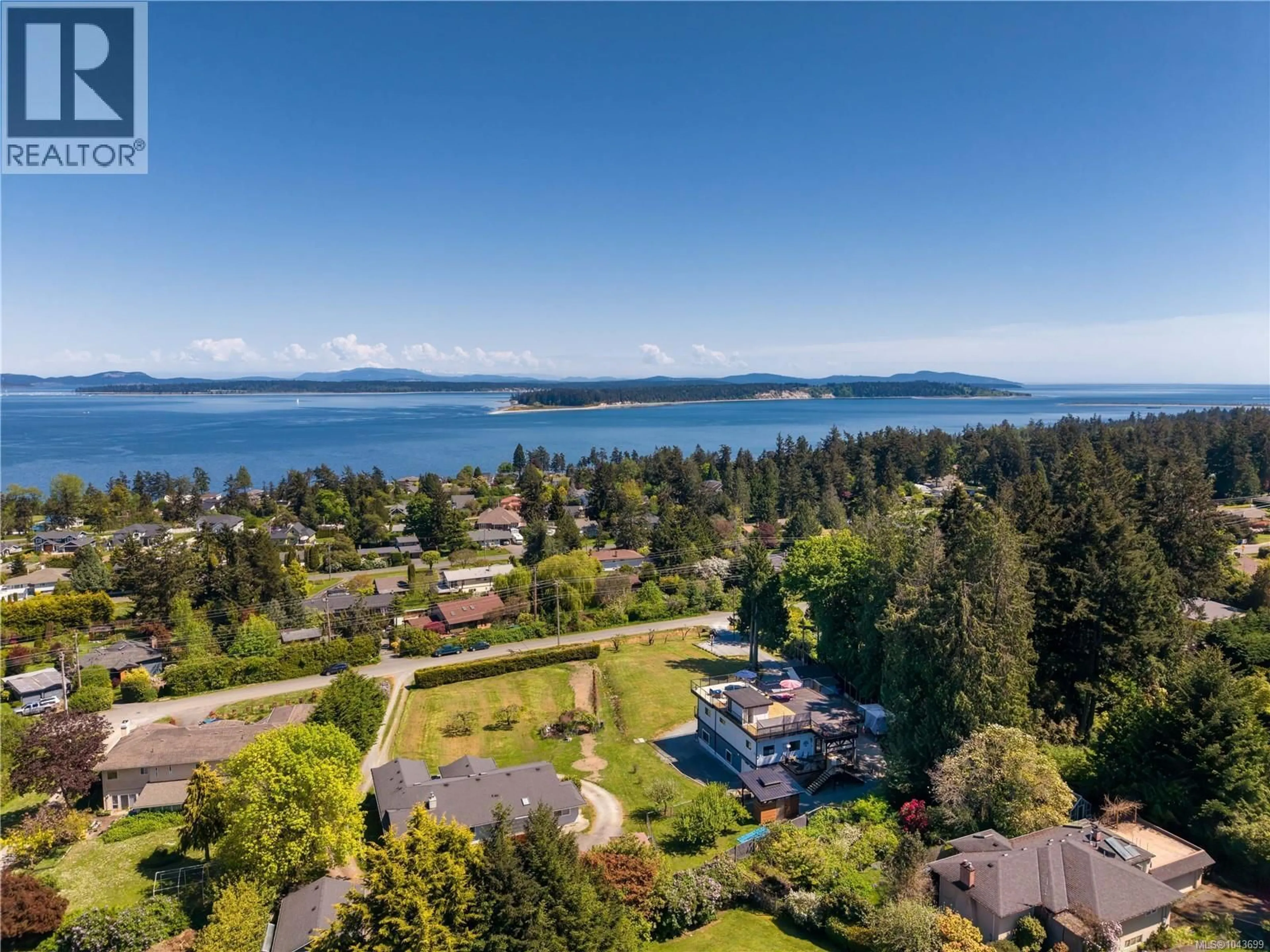 A pic from outside/outdoor area/front of a property/back of a property/a pic from drone, water/lake/river/ocean view for 8630 ALDOUS TERRACE, North Saanich British Columbia V8L1L2