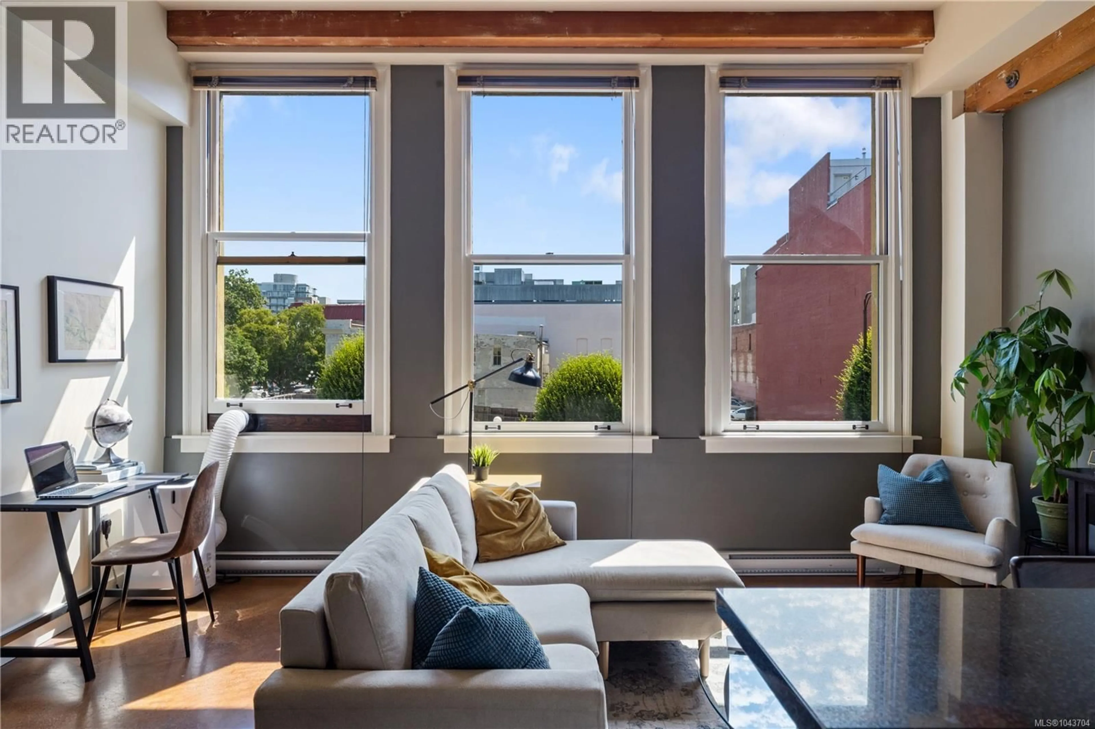 Living room with furniture, unknown for 212 - 599 PANDORA AVENUE, Victoria British Columbia V8W1N5