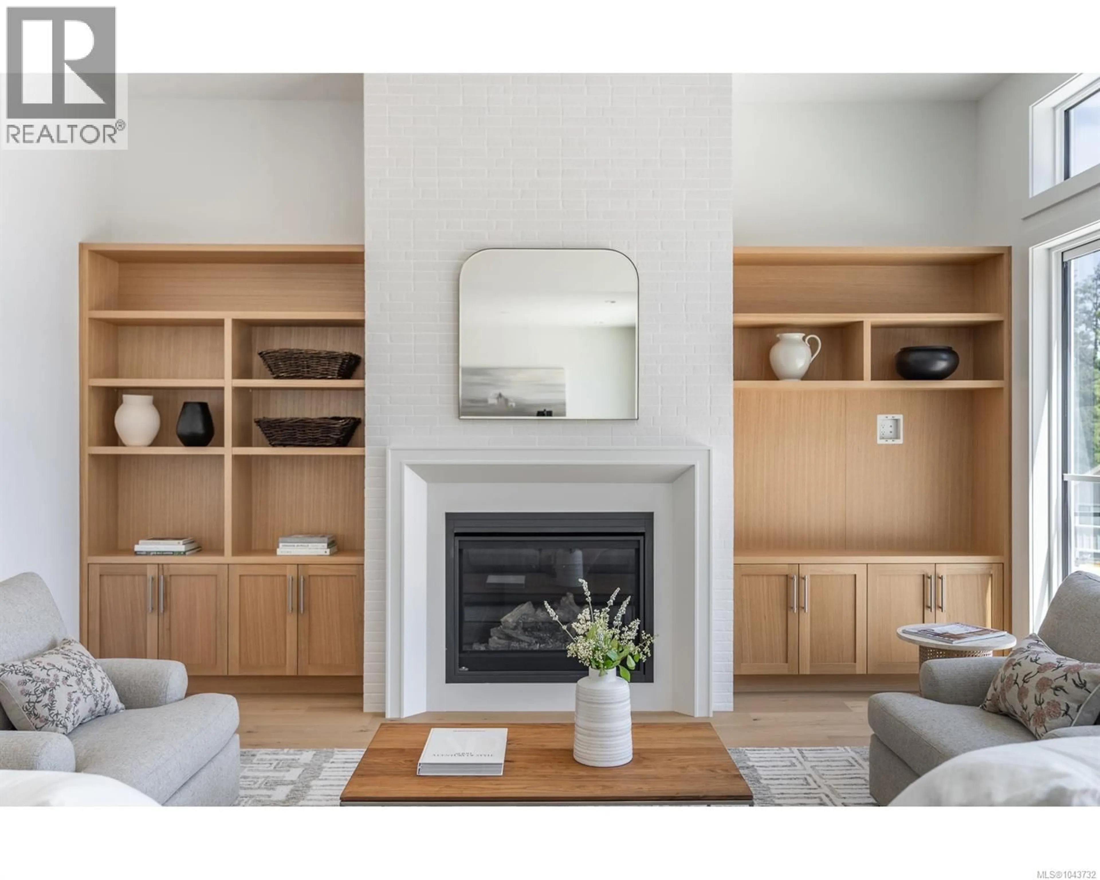 Living room with furniture, wood/laminate floor for 1043 HAREWOOD MINES ROAD, Nanaimo British Columbia V9R5P5