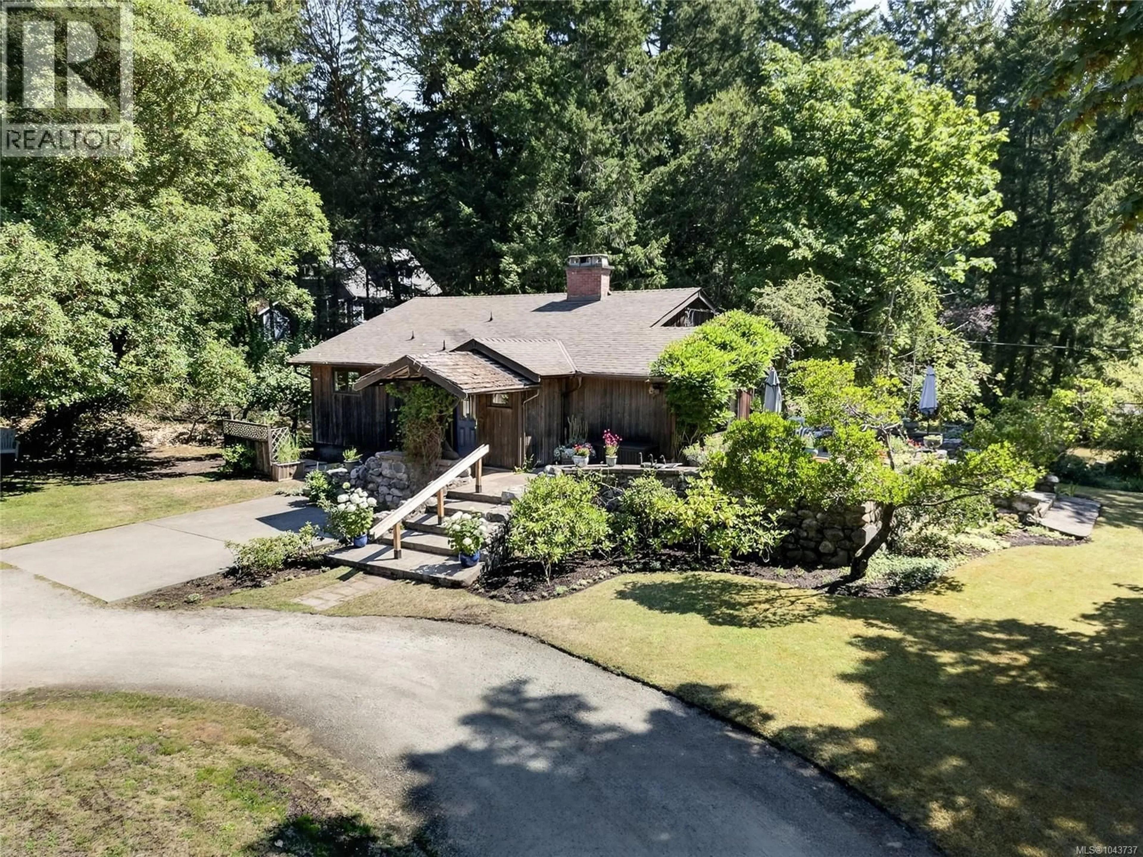 A pic from outside/outdoor area/front of a property/back of a property/a pic from drone, street for 1390 LAUREL ROAD, North Saanich British Columbia V8L5K8