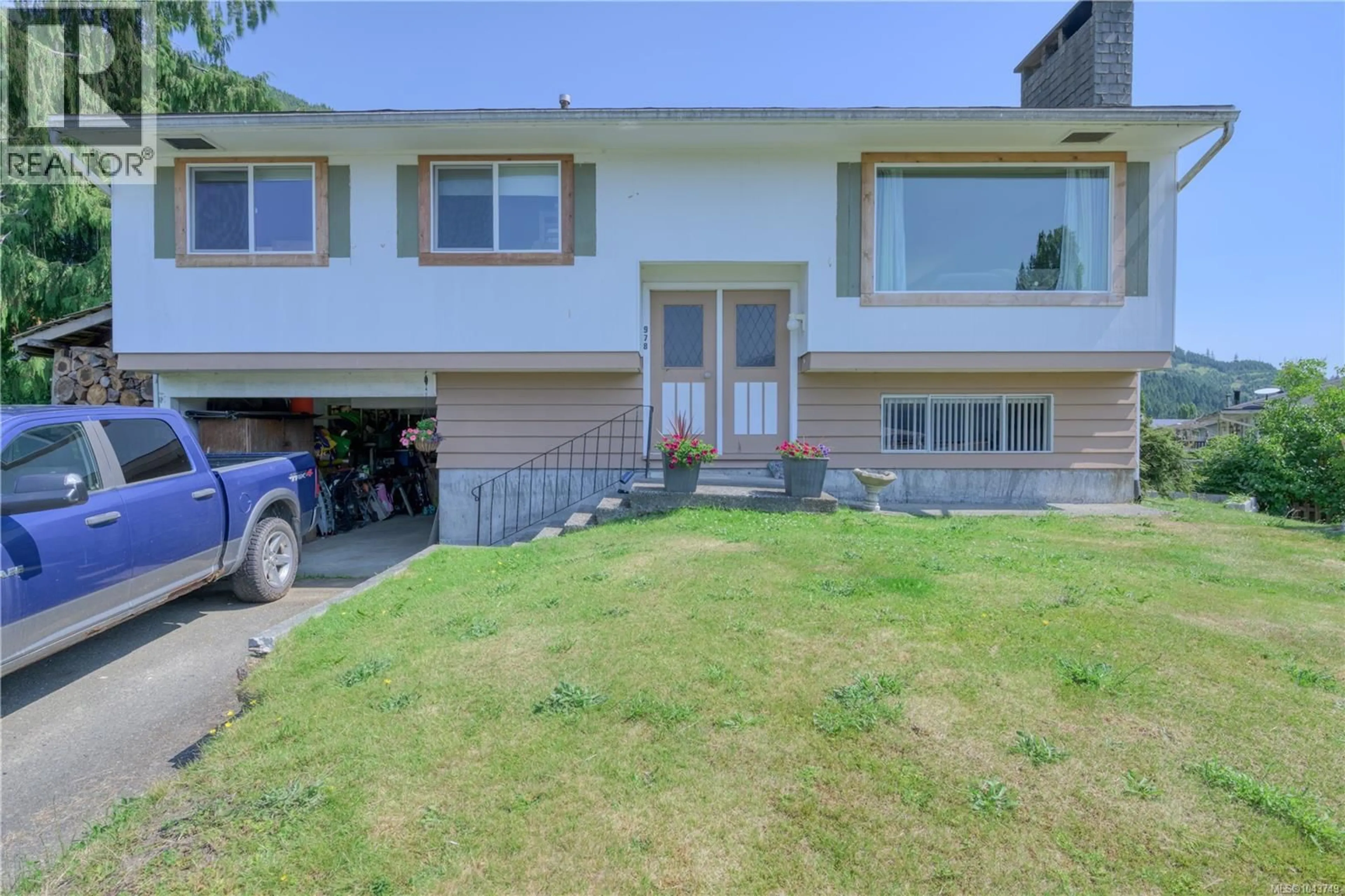 Home with vinyl exterior material, street for 978 RUPERT AVENUE, Port Alice British Columbia V0N2N0