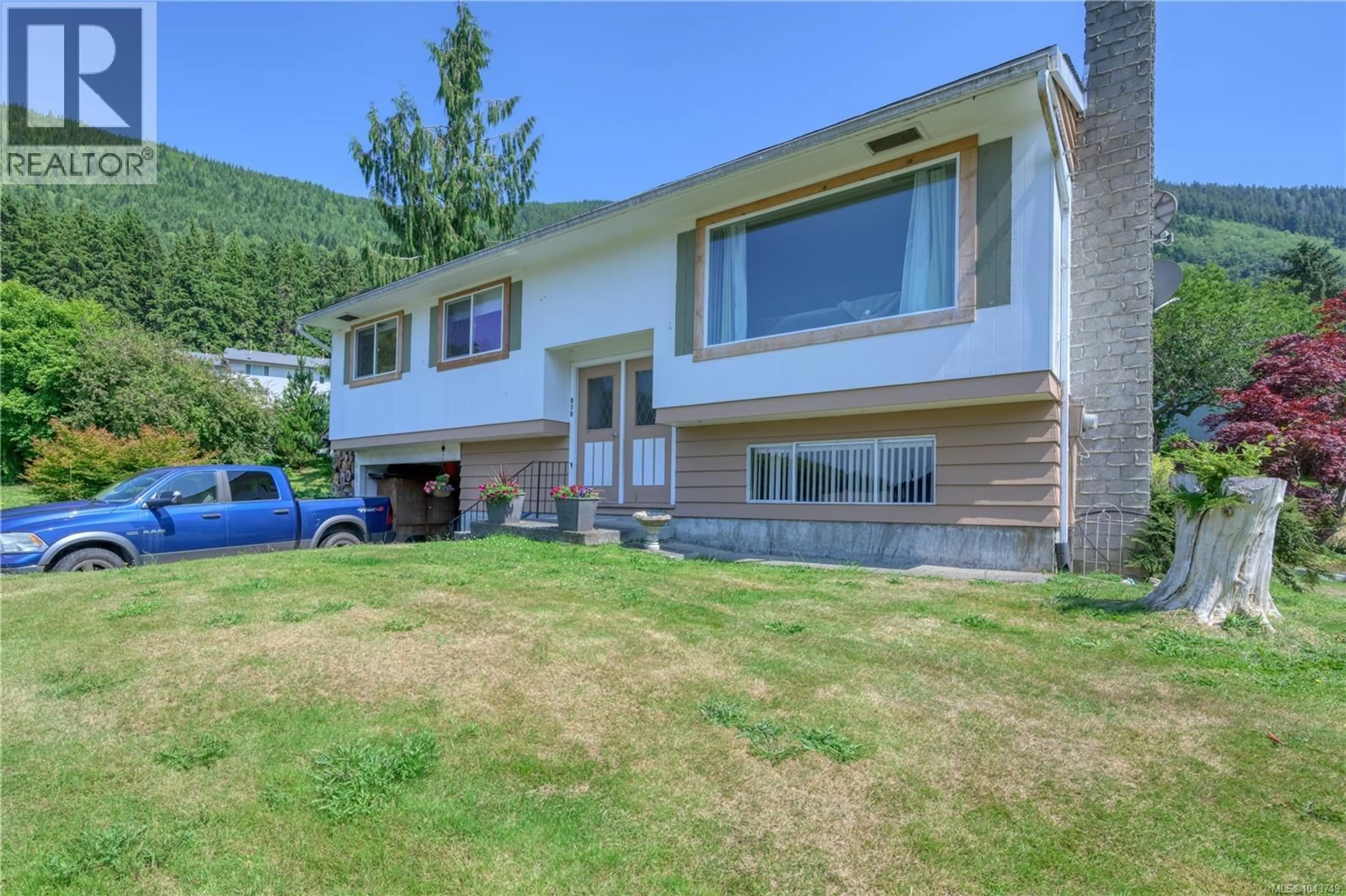 Home with vinyl exterior material, mountain view for 978 RUPERT AVENUE, Port Alice British Columbia V0N2N0