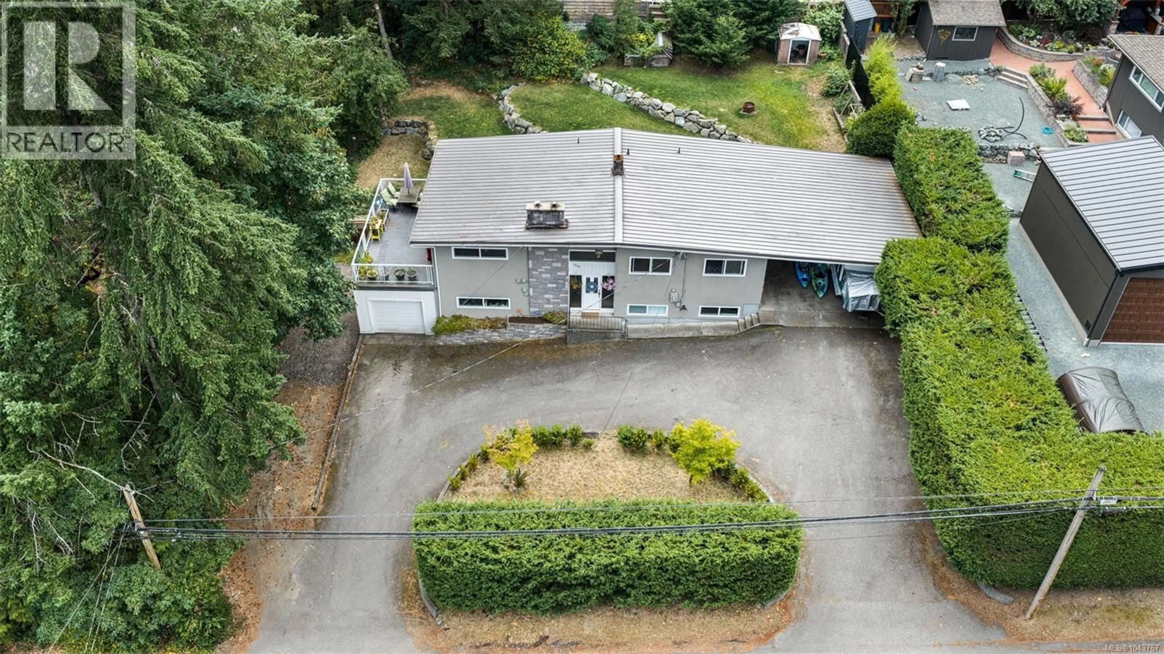 A pic from outside/outdoor area/front of a property/back of a property/a pic from drone, unknown for 1080 MAPLE BAY ROAD, Duncan British Columbia V9L5X1