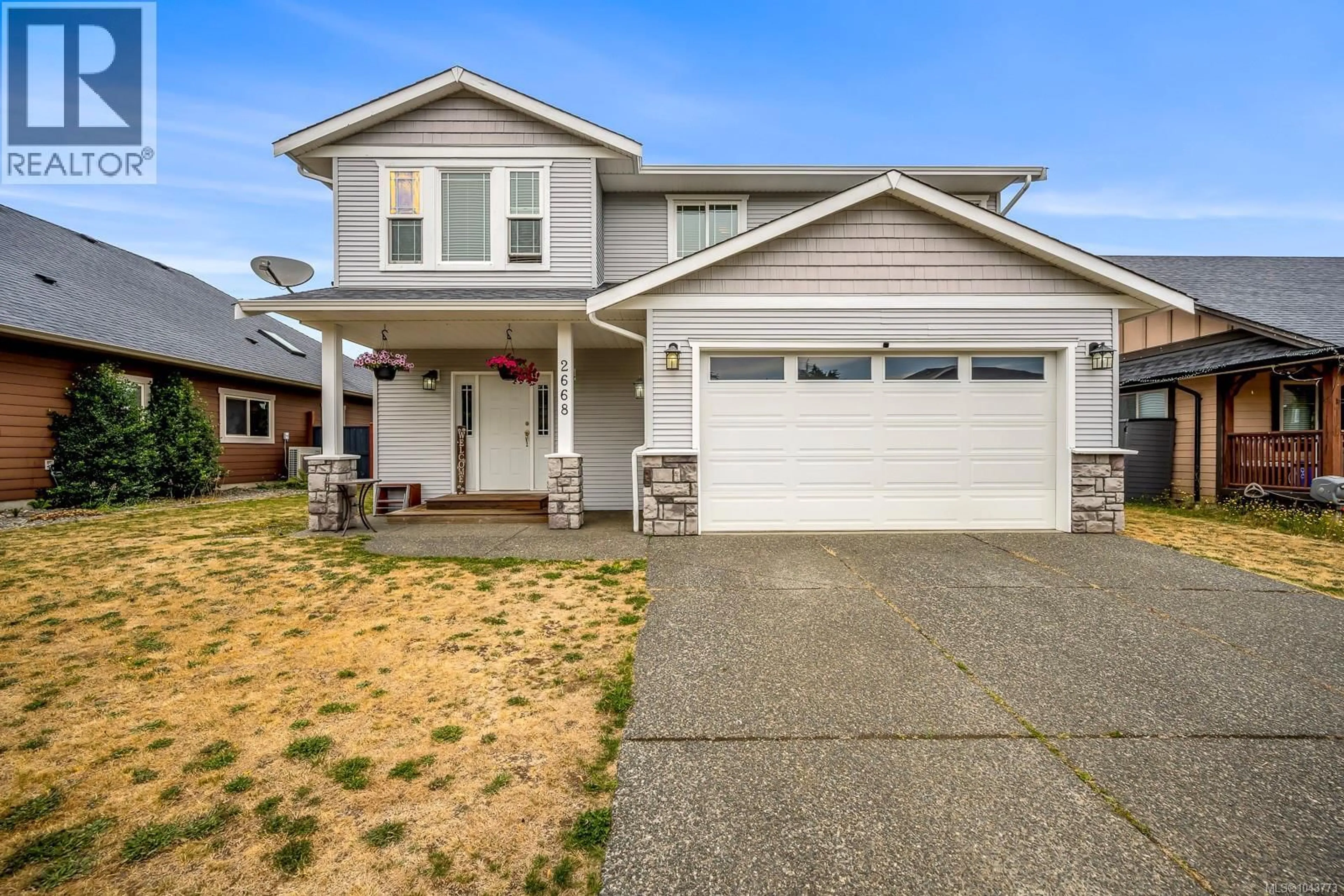 Home with vinyl exterior material, street for 2668 GRIZEDALE AVENUE, Cumberland British Columbia V0R1S0