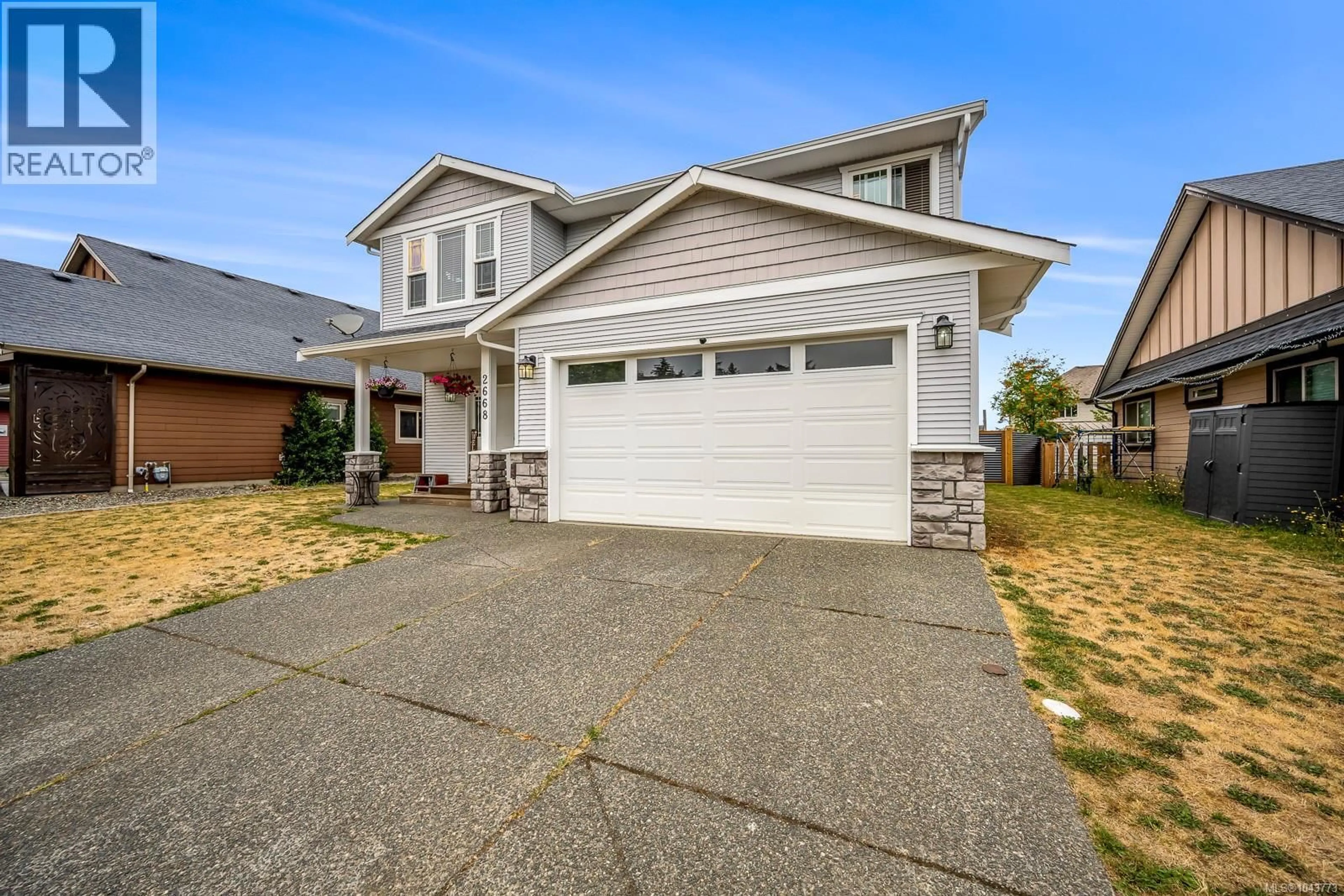 Home with vinyl exterior material, street for 2668 GRIZEDALE AVENUE, Cumberland British Columbia V0R1S0