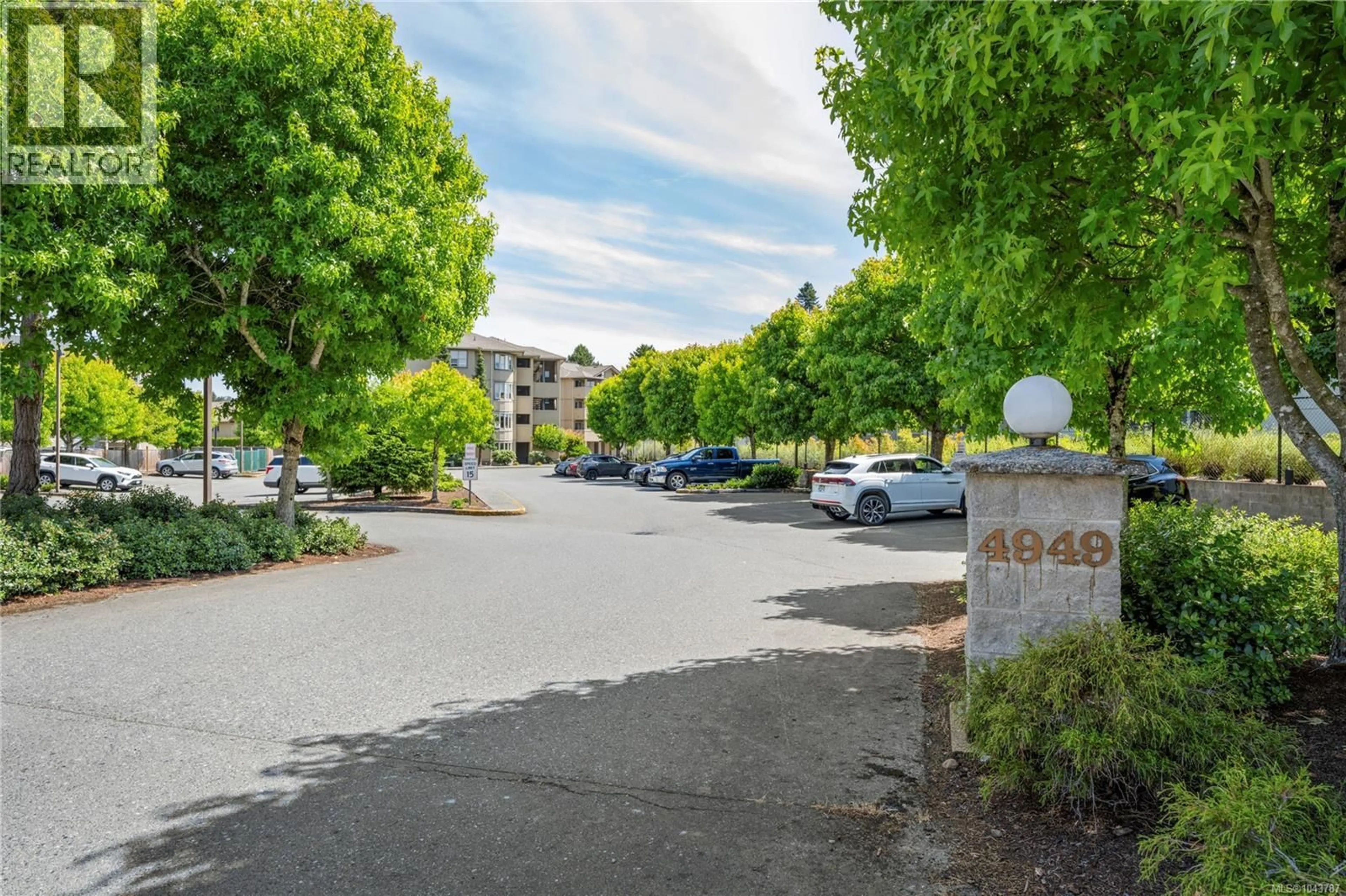 A pic from outside/outdoor area/front of a property/back of a property/a pic from drone, street for 410 - 4949 WILLS ROAD, Nanaimo British Columbia V9T2K4