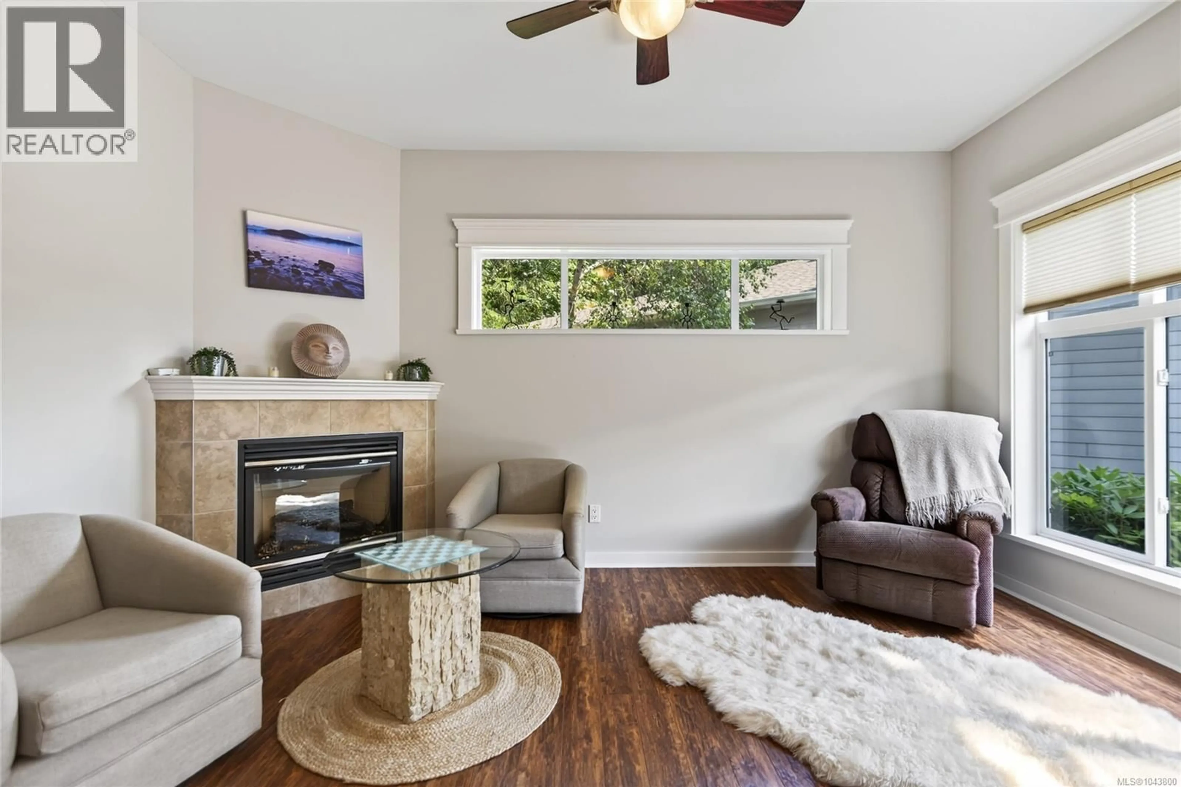 Living room with furniture, wood/laminate floor for 63 - 2001 BLUE JAY PLACE, Courtenay British Columbia V9N4A8