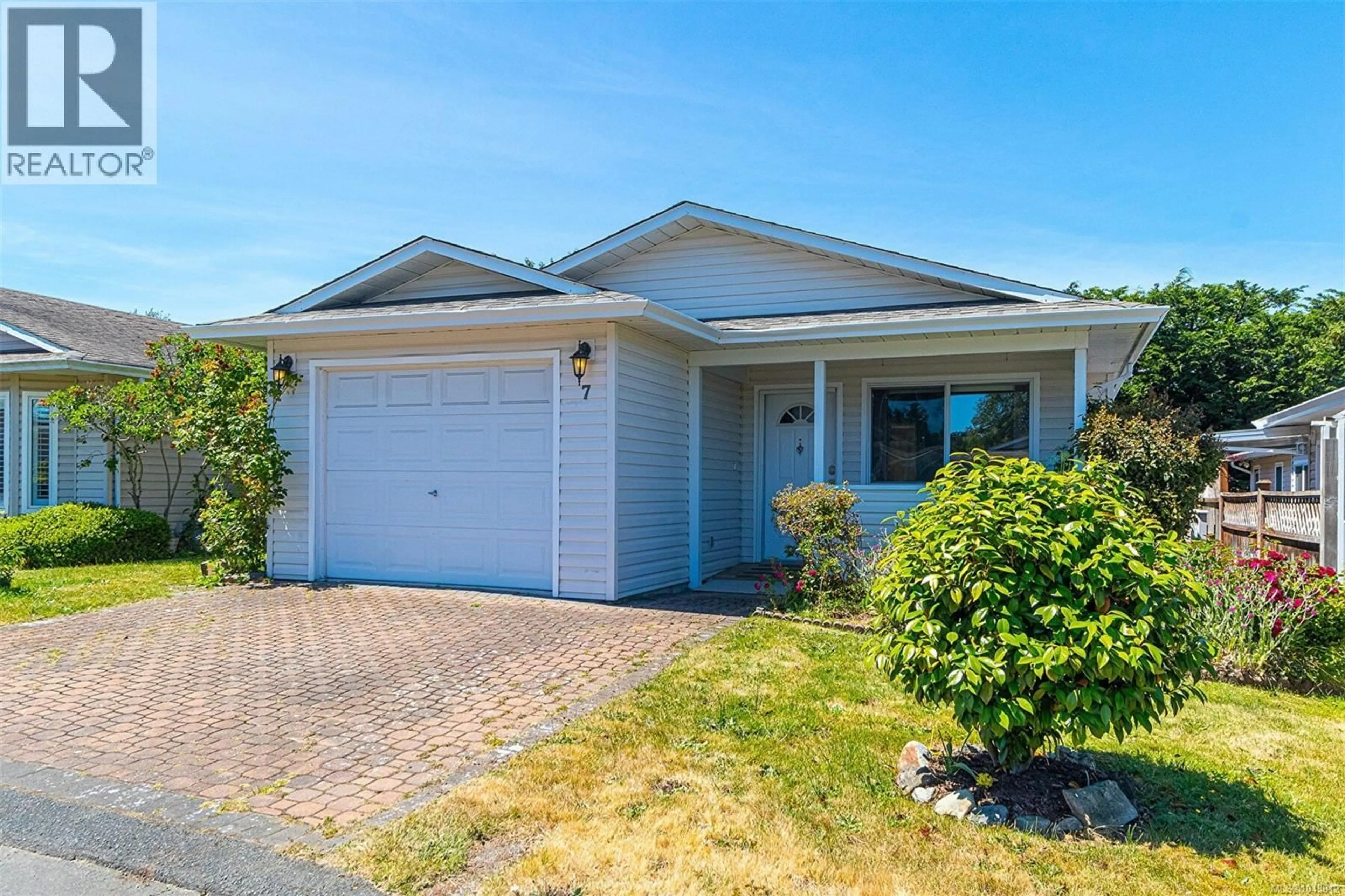 Home with vinyl exterior material, street for 7 EAGLE LANE, View Royal British Columbia V9A7M2