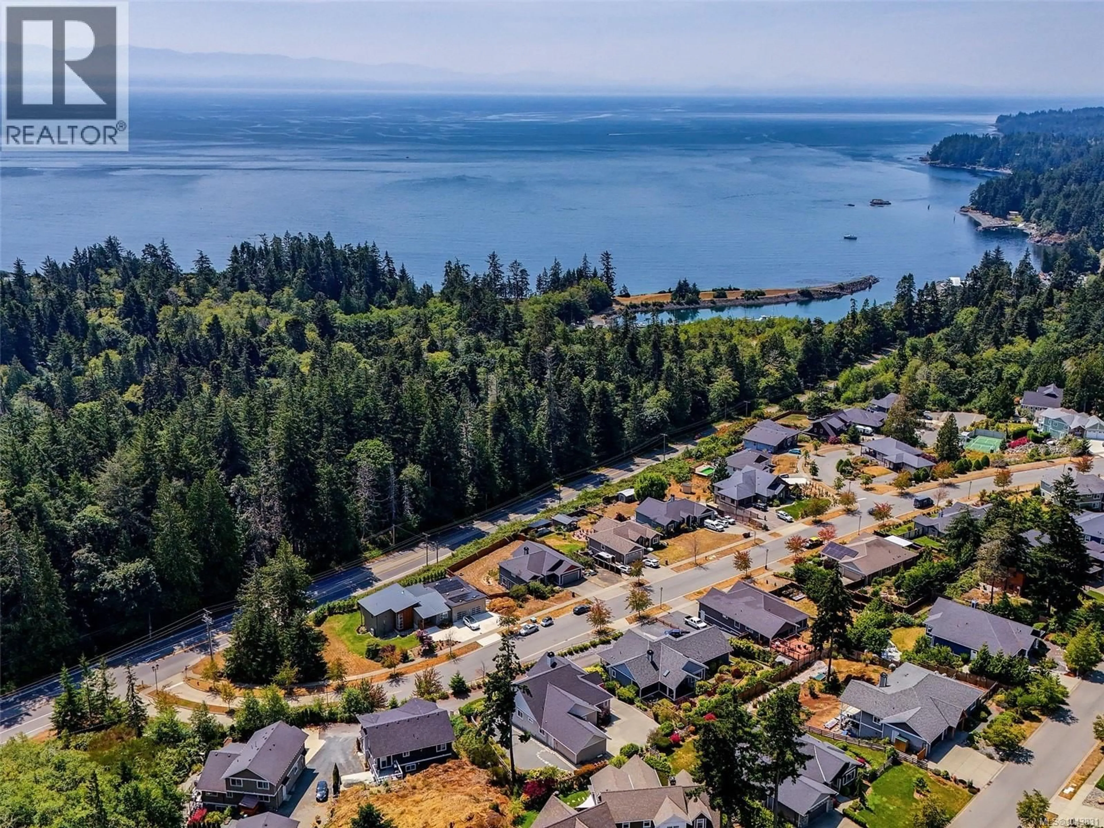 A pic from outside/outdoor area/front of a property/back of a property/a pic from drone, water/lake/river/ocean view for 2125 ERINAN BOULEVARD, Sooke British Columbia V9Z1M8