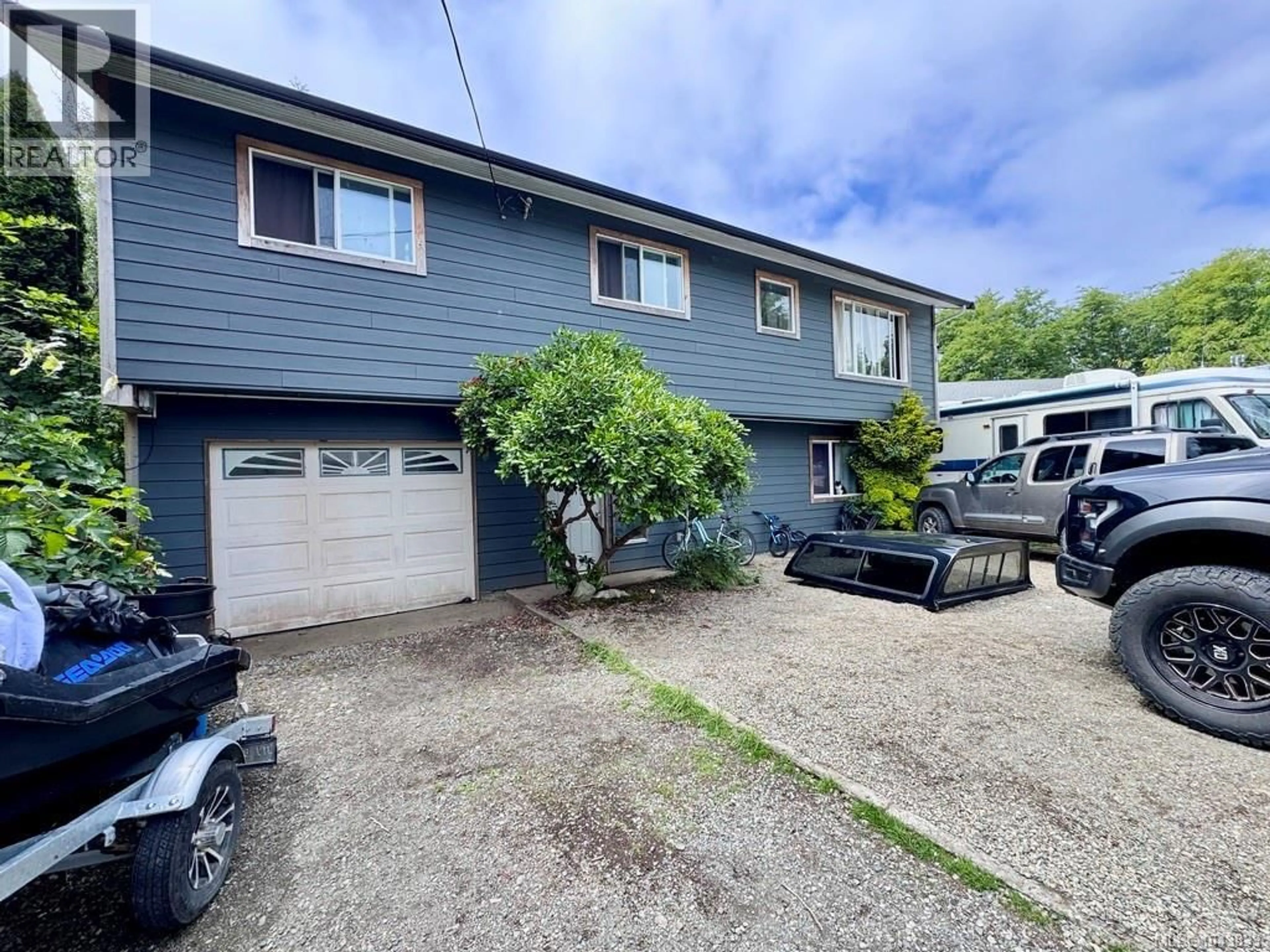 A pic from outside/outdoor area/front of a property/back of a property/a pic from drone, street for 1690 HOLLY CRESCENT, Ucluelet British Columbia V0R3A0