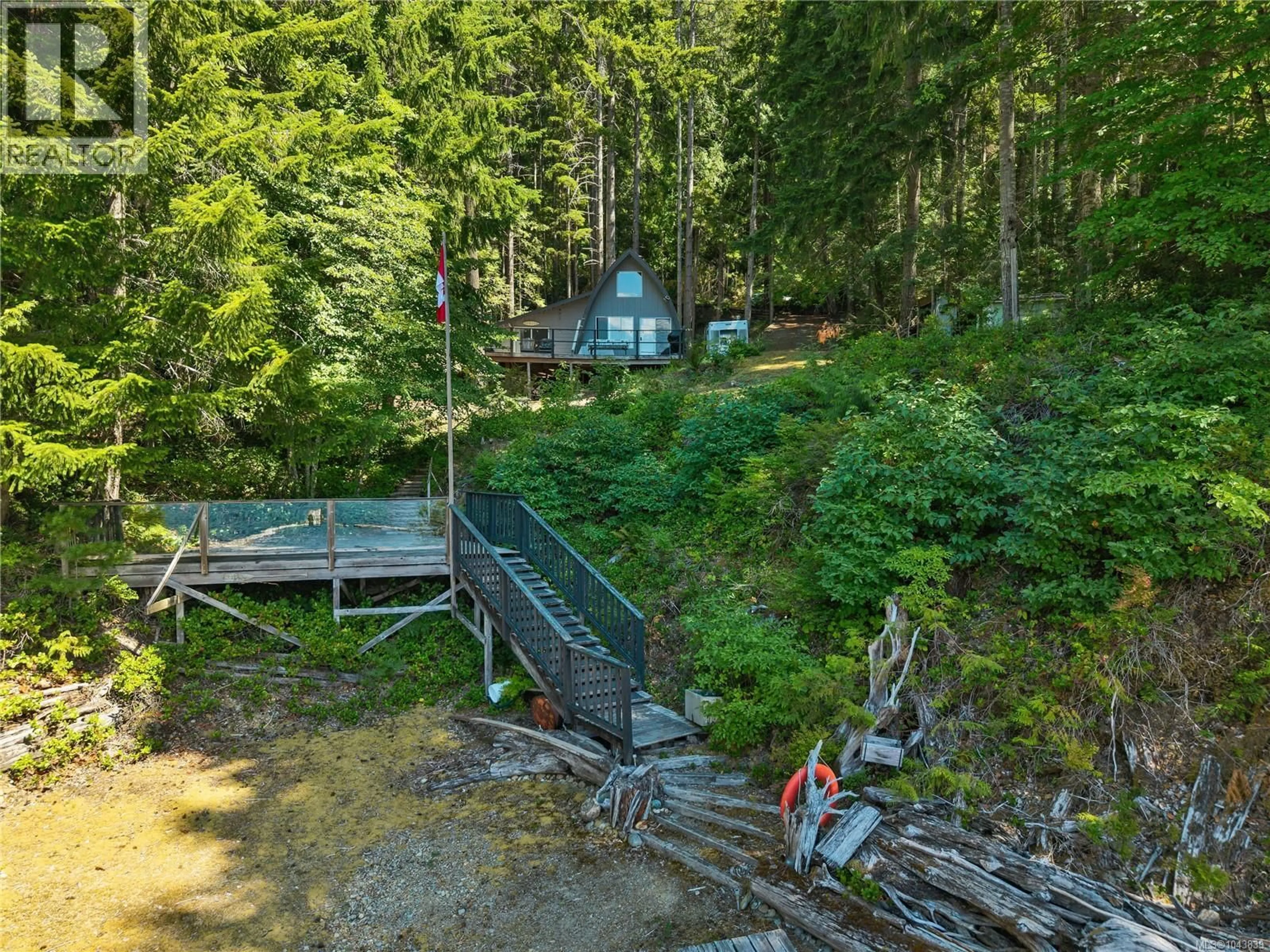 A pic from outside/outdoor area/front of a property/back of a property/a pic from drone, forest/trees view for 40800 GOLD RIVER HIGHWAY, Campbell River British Columbia V9W5C5
