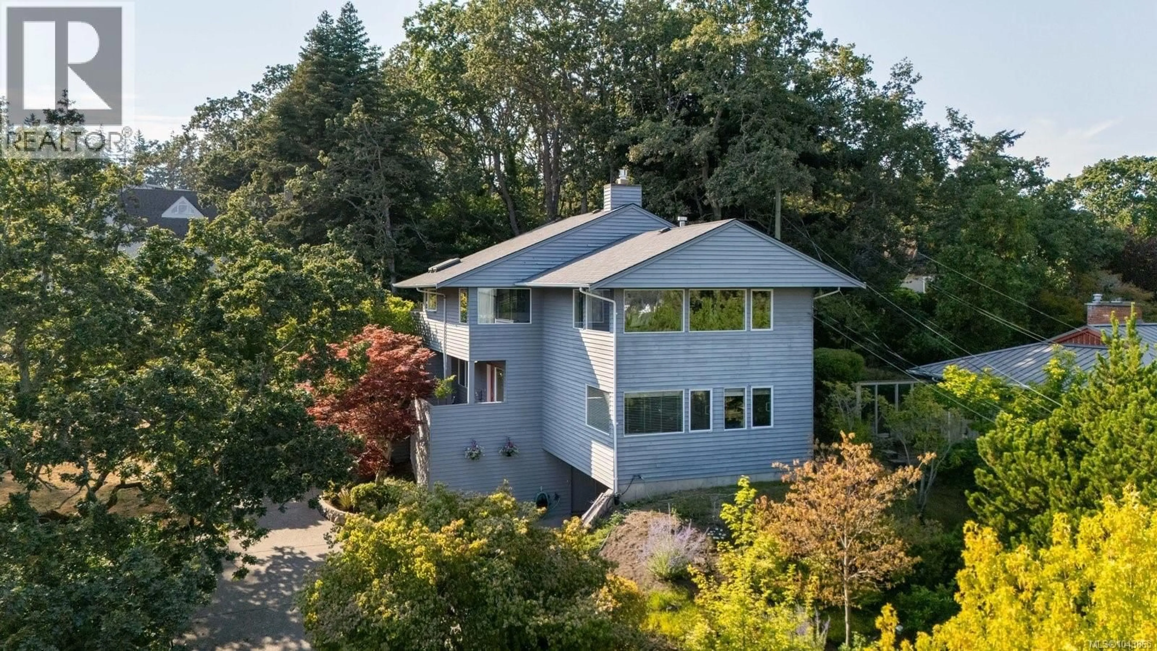 A pic from outside/outdoor area/front of a property/back of a property/a pic from drone, building for 3656 CADBORO BAY ROAD, Oak Bay British Columbia V8R5K8