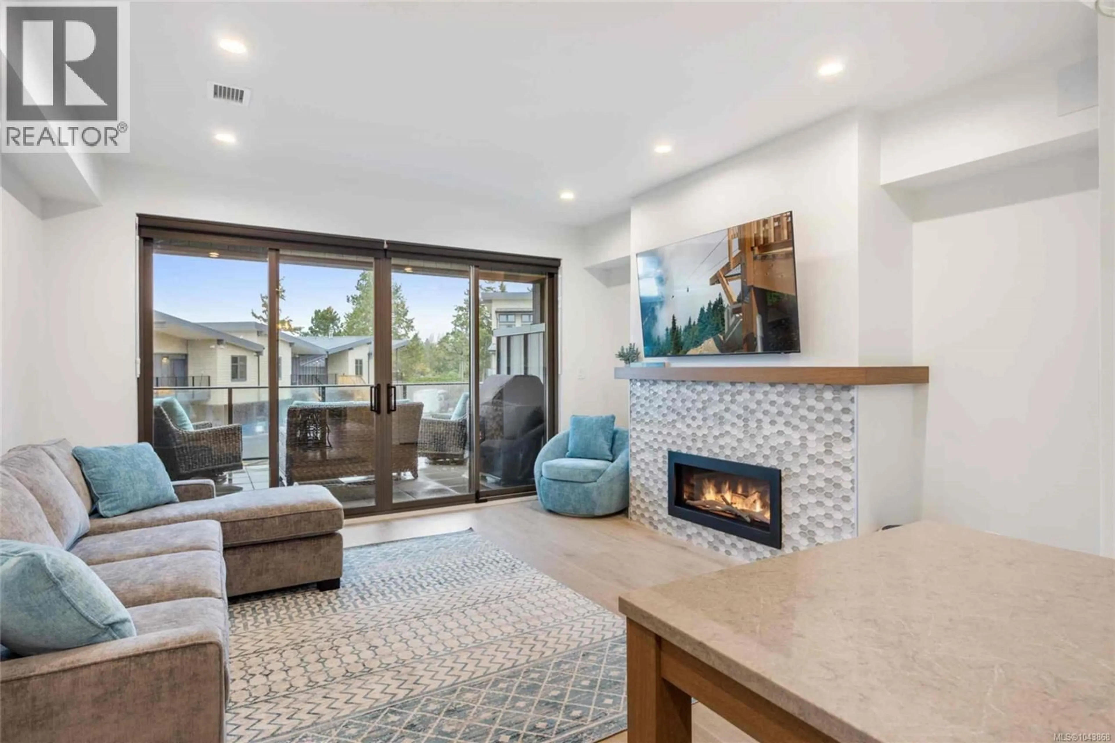 Living room with furniture, ceramic/tile floor for 10 - 9022 CLARKSON AVENUE, Black Creek British Columbia V9J1B3