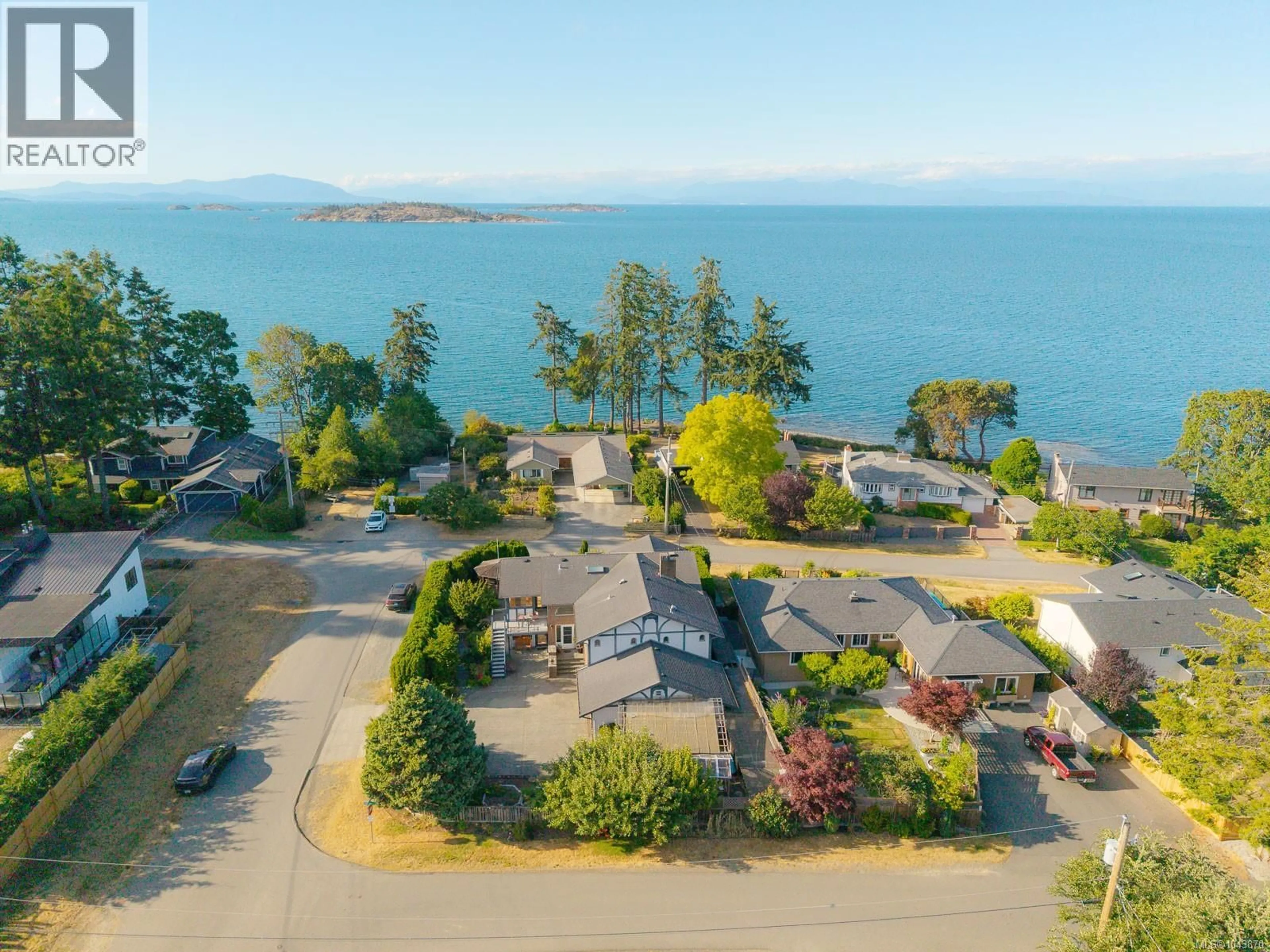A pic from outside/outdoor area/front of a property/back of a property/a pic from drone, water/lake/river/ocean view for 7115 HUDDLESTONE ROAD, Lantzville British Columbia V0R2H0