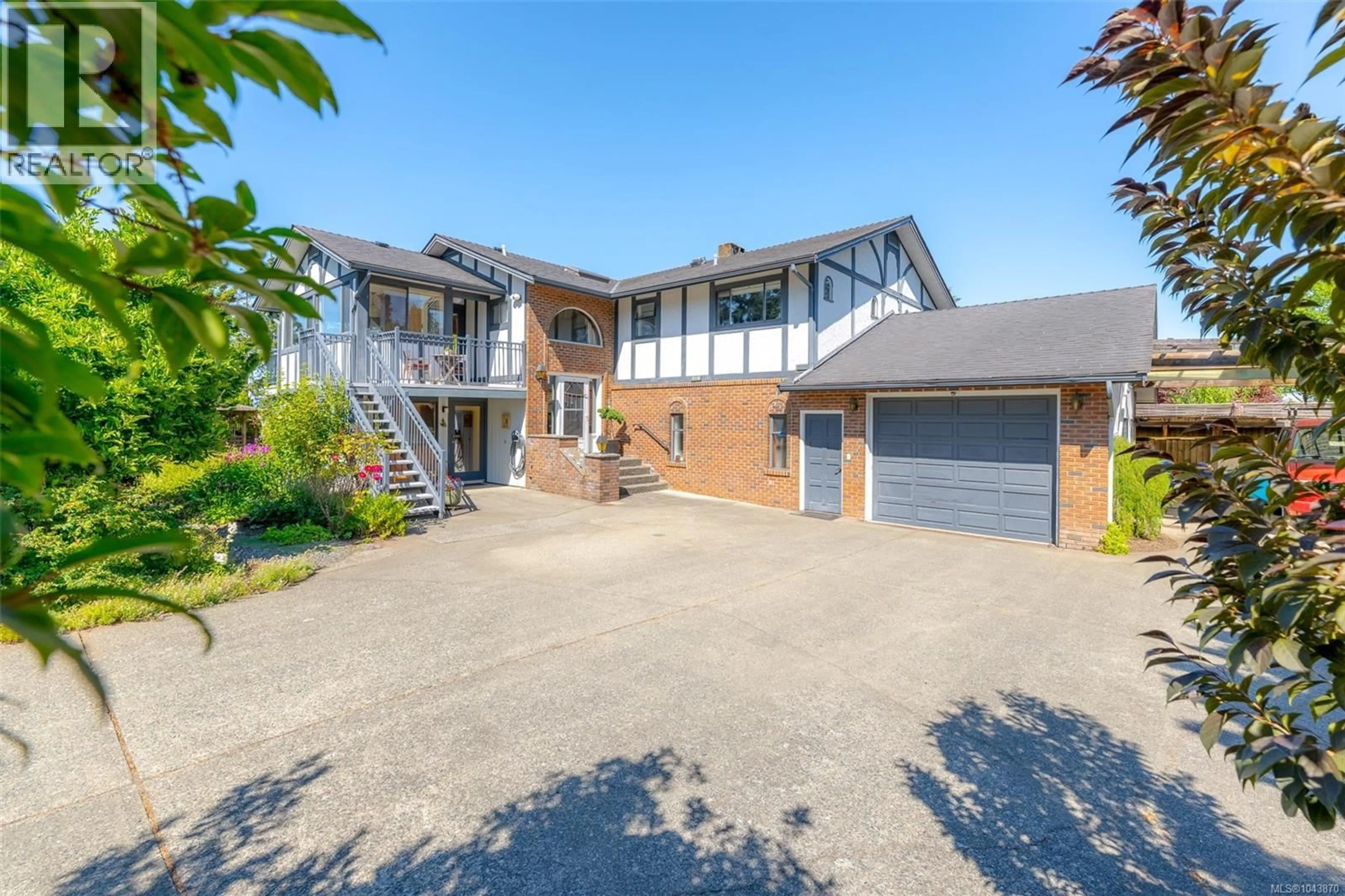 A pic from outside/outdoor area/front of a property/back of a property/a pic from drone, street for 7115 HUDDLESTONE ROAD, Lantzville British Columbia V0R2H0