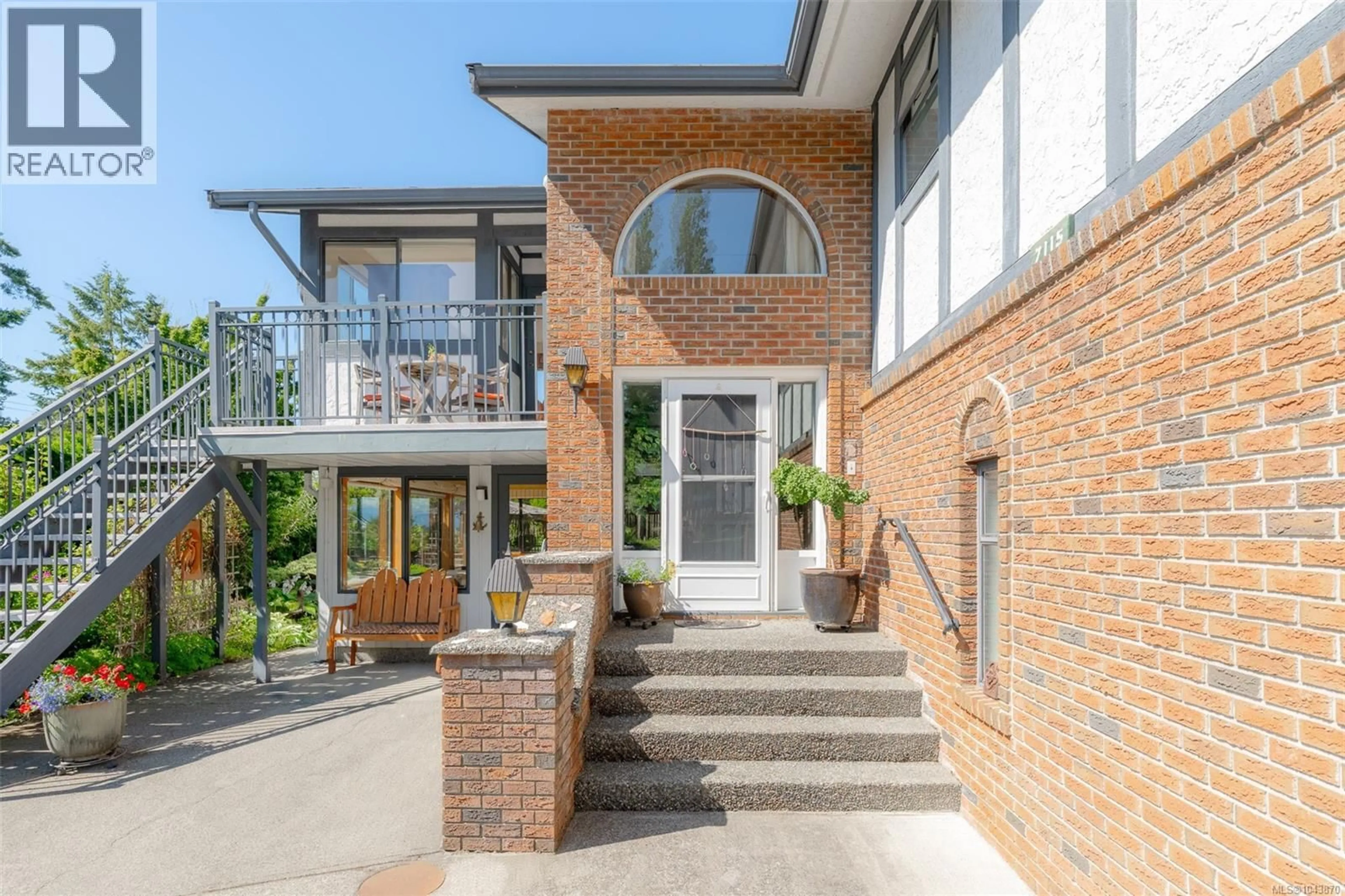 Home with brick exterior material, building for 7115 HUDDLESTONE ROAD, Lantzville British Columbia V0R2H0
