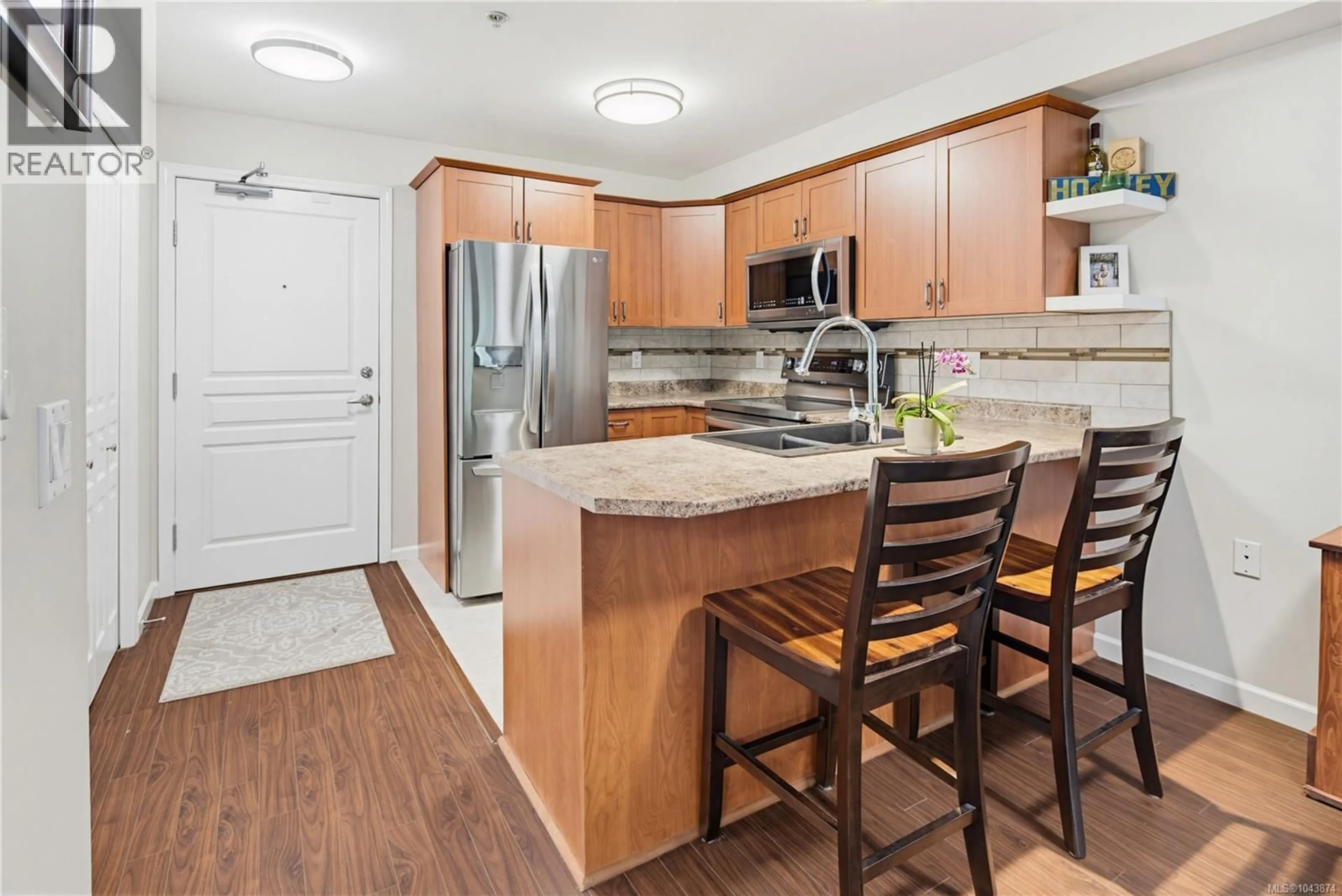 Open concept kitchen, wood/laminate floor for 205 - 663 GOLDSTREAM AVENUE, Langford British Columbia V9B2W9