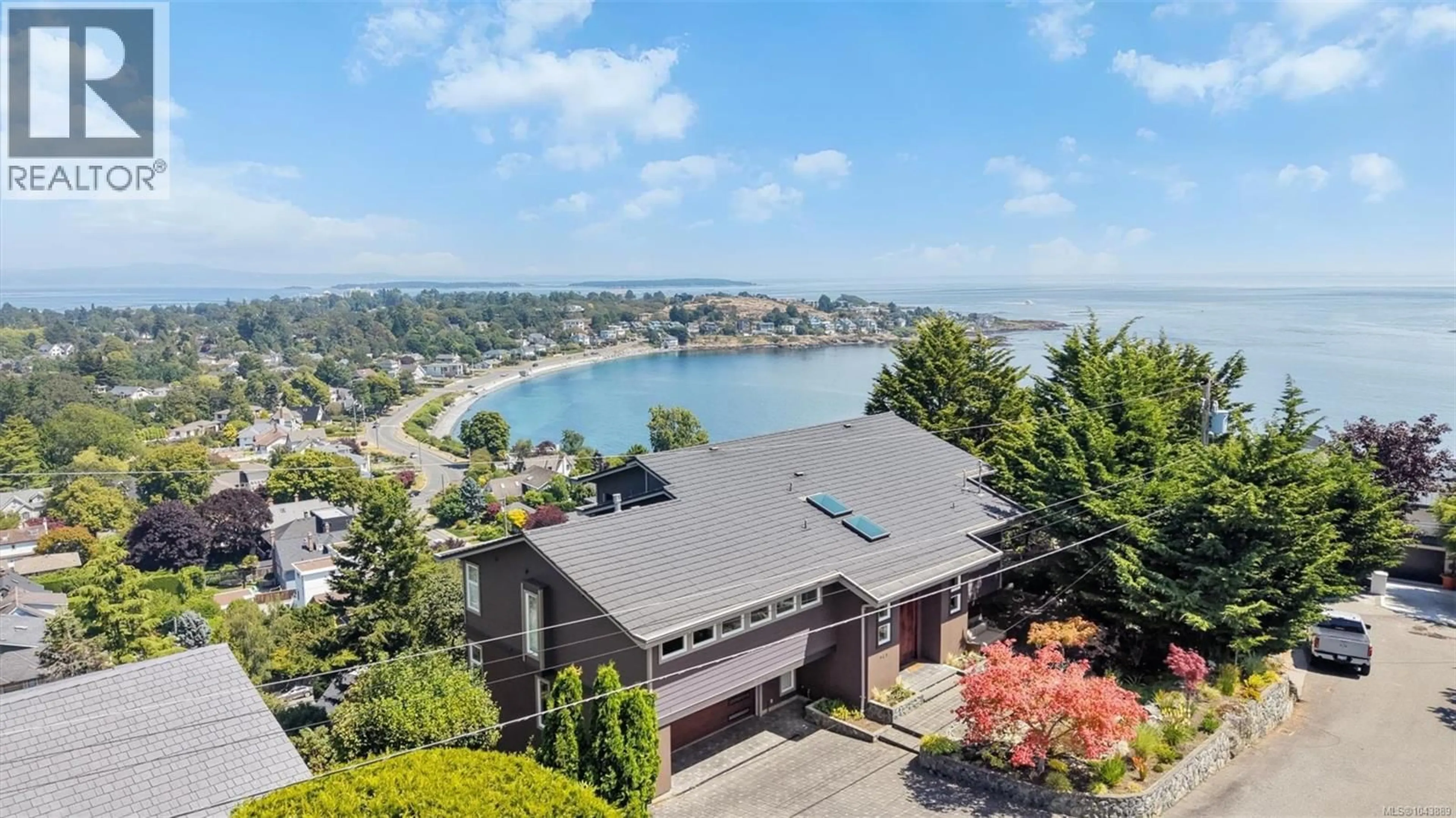 A pic from outside/outdoor area/front of a property/back of a property/a pic from drone, water/lake/river/ocean view for 141 DENISON ROAD, Oak Bay British Columbia V8S4K2