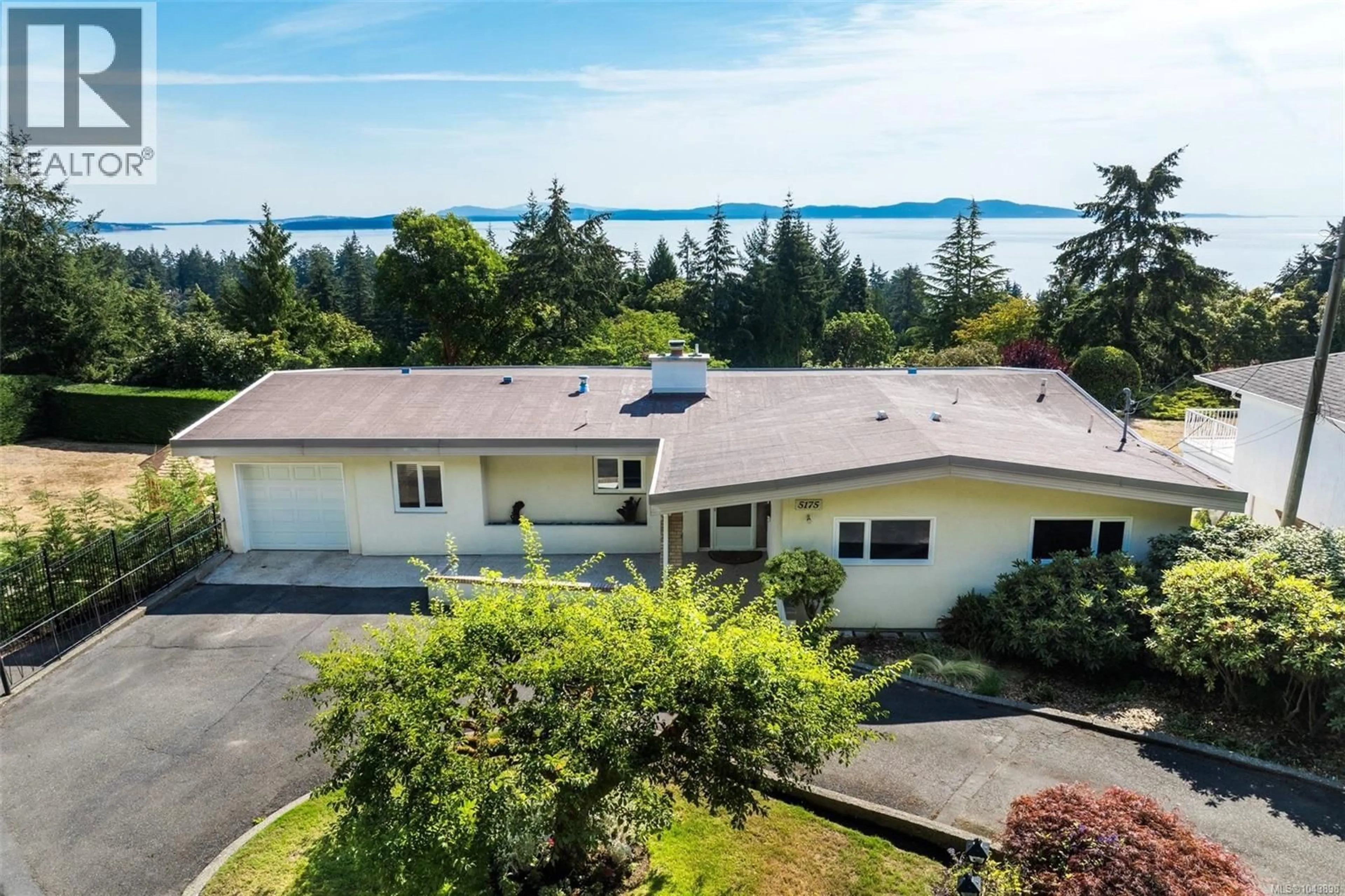 A pic from outside/outdoor area/front of a property/back of a property/a pic from drone, water/lake/river/ocean view for 5175 POLSON TERRACE, Saanich British Columbia V8Y2C5