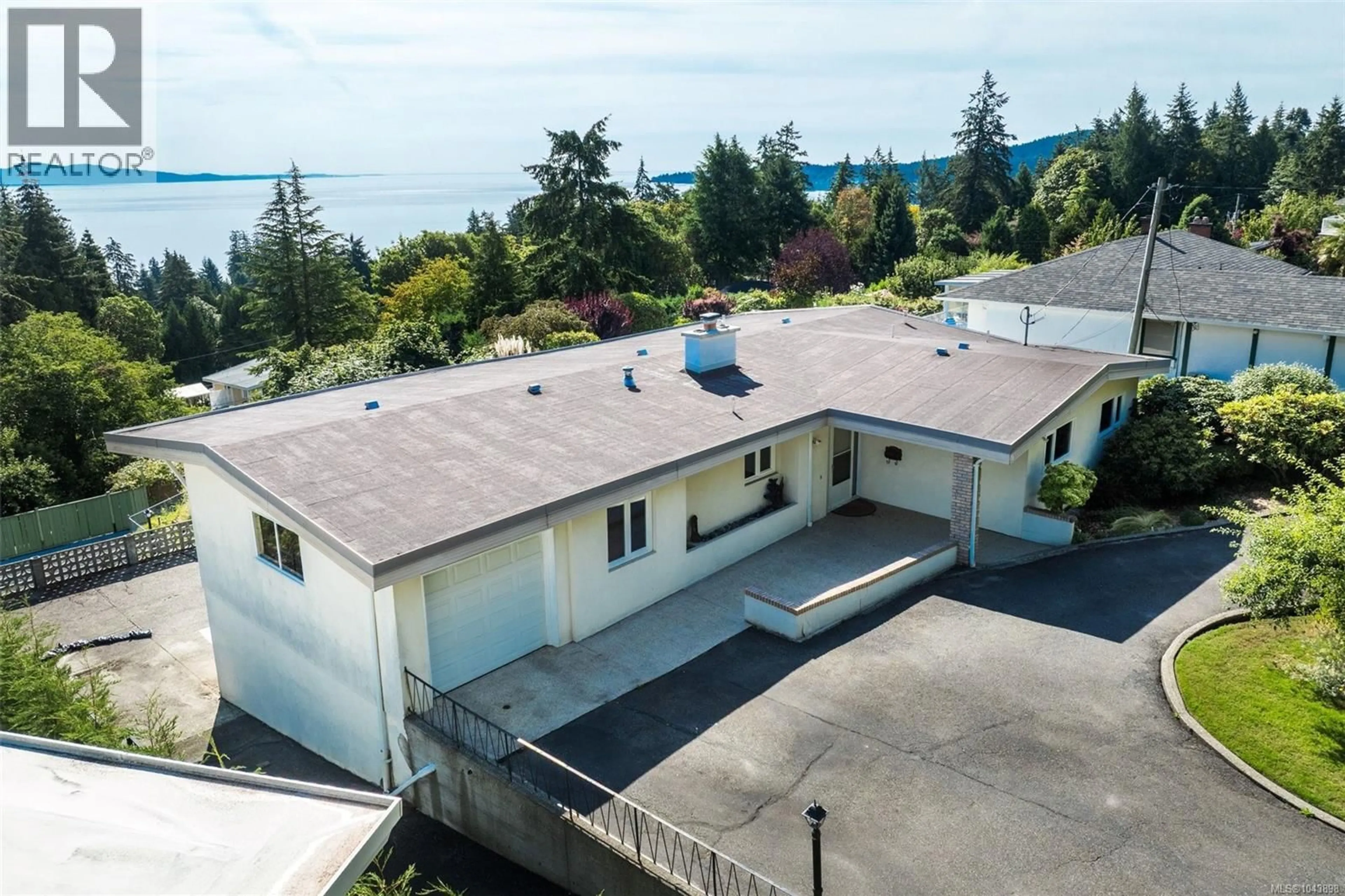 A pic from outside/outdoor area/front of a property/back of a property/a pic from drone, unknown for 5175 POLSON TERRACE, Saanich British Columbia V8Y2C5