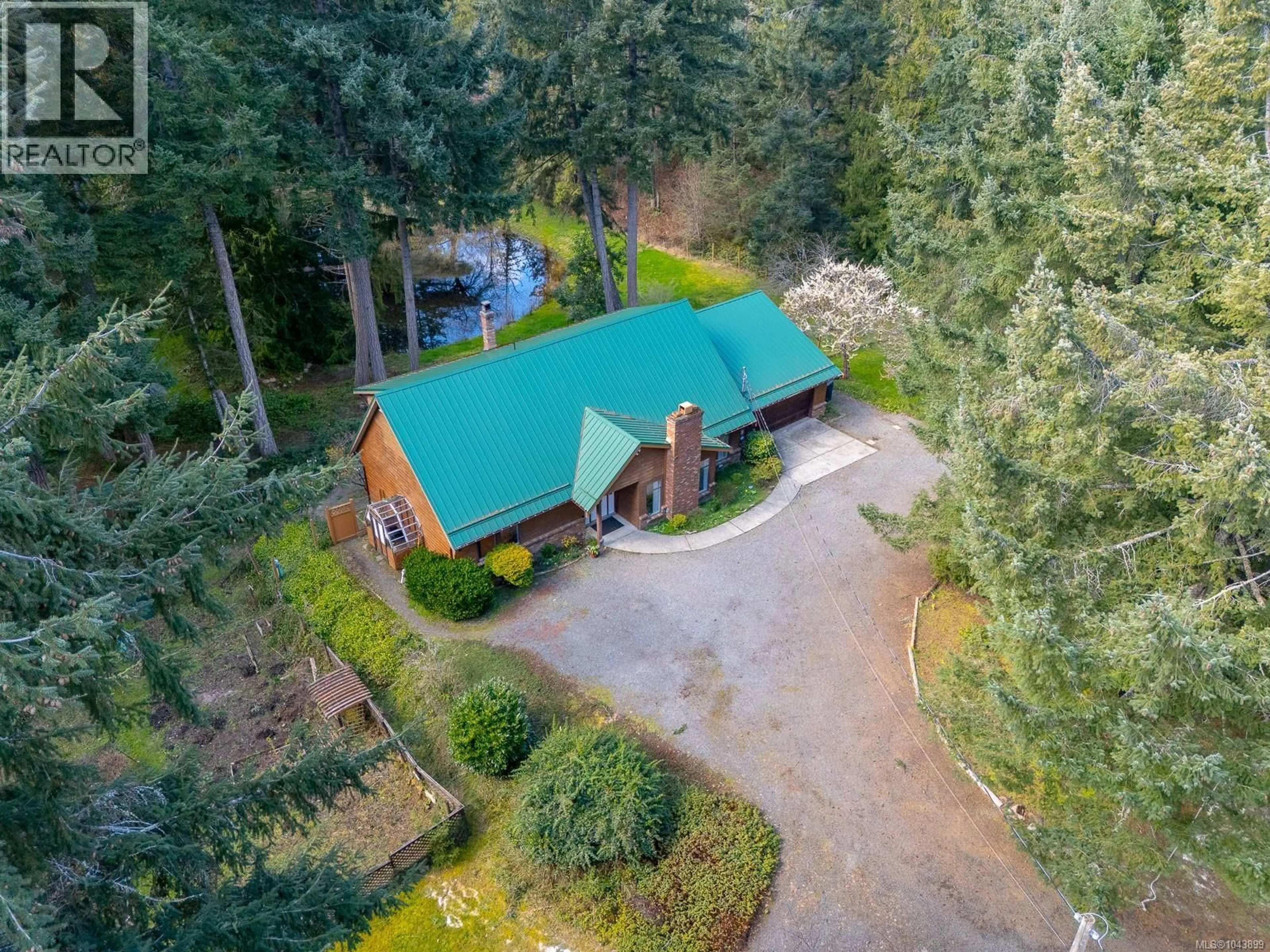 A pic from outside/outdoor area/front of a property/back of a property/a pic from drone, forest/trees view for 3035 WILD ROSE BOULEVARD, Nanoose Bay British Columbia V9P9E4