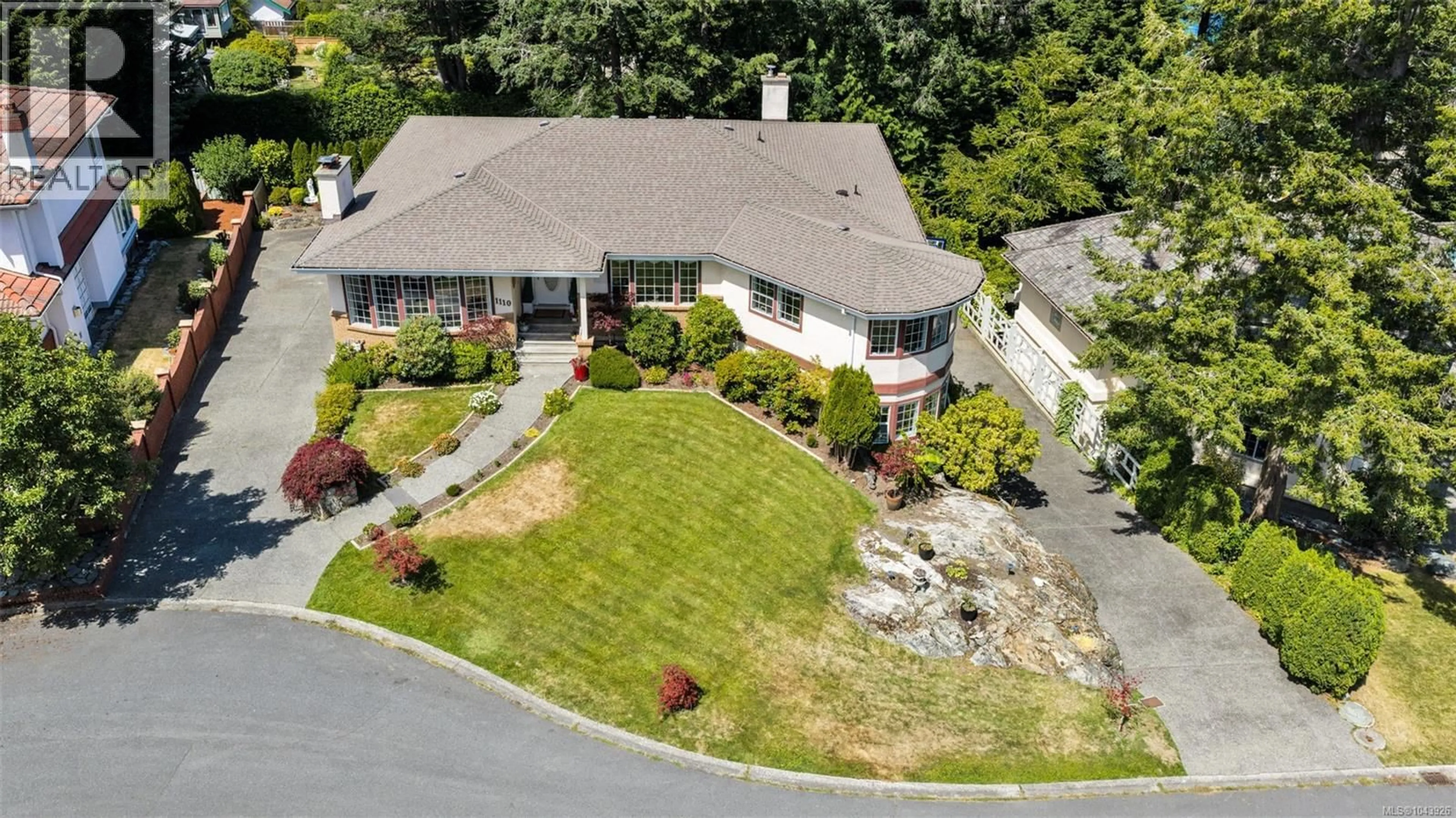 A pic from outside/outdoor area/front of a property/back of a property/a pic from drone, unknown for 1110 TOTEM LANE, Saanich British Columbia V8Y1E8