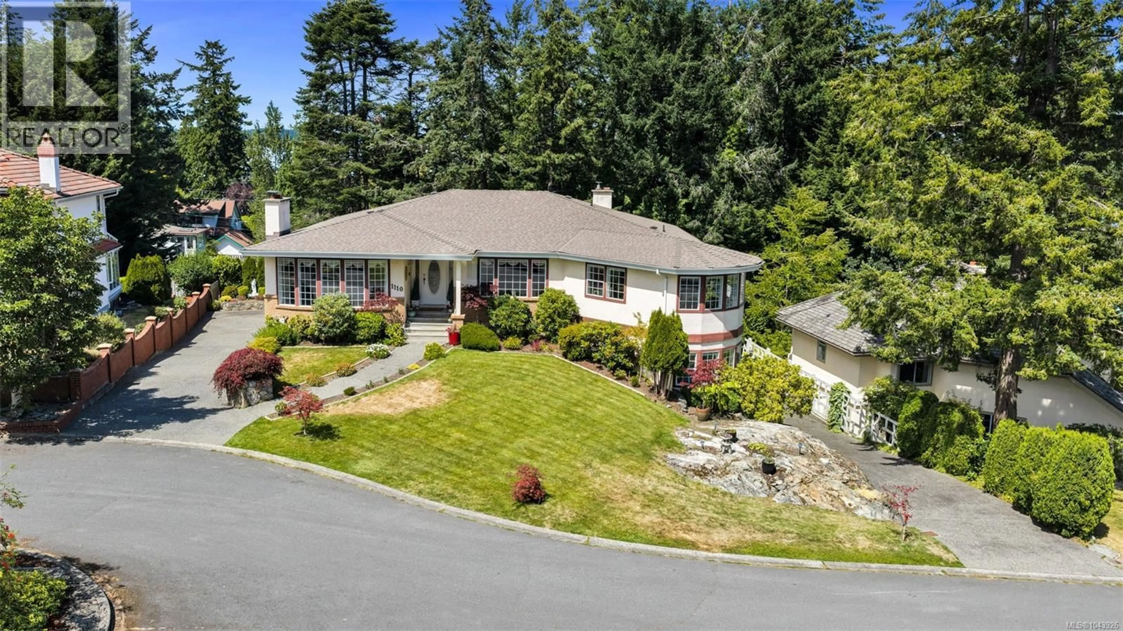 A pic from outside/outdoor area/front of a property/back of a property/a pic from drone, unknown for 1110 TOTEM LANE, Saanich British Columbia V8Y1E8