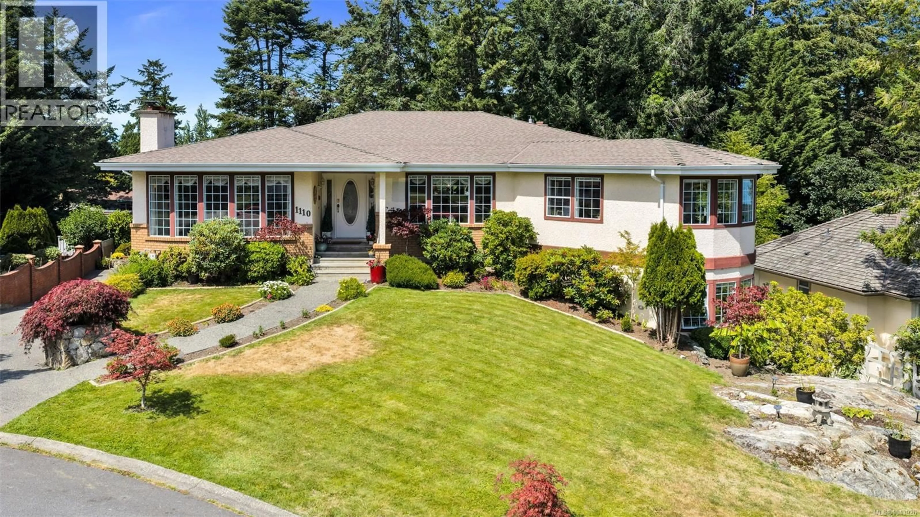 Home with vinyl exterior material, street for 1110 TOTEM LANE, Saanich British Columbia V8Y1E8
