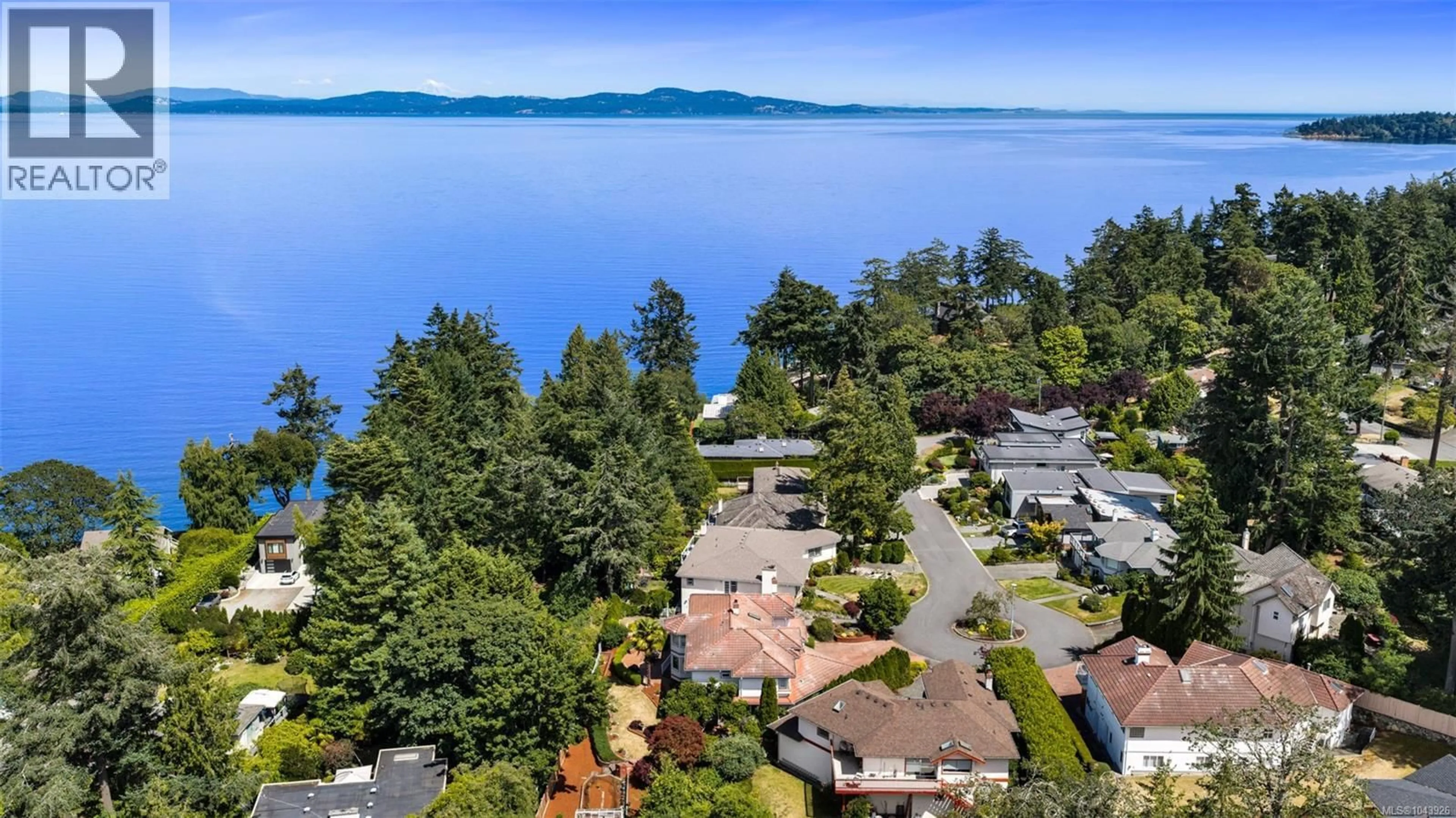 A pic from outside/outdoor area/front of a property/back of a property/a pic from drone, water/lake/river/ocean view for 1110 TOTEM LANE, Saanich British Columbia V8Y1E8