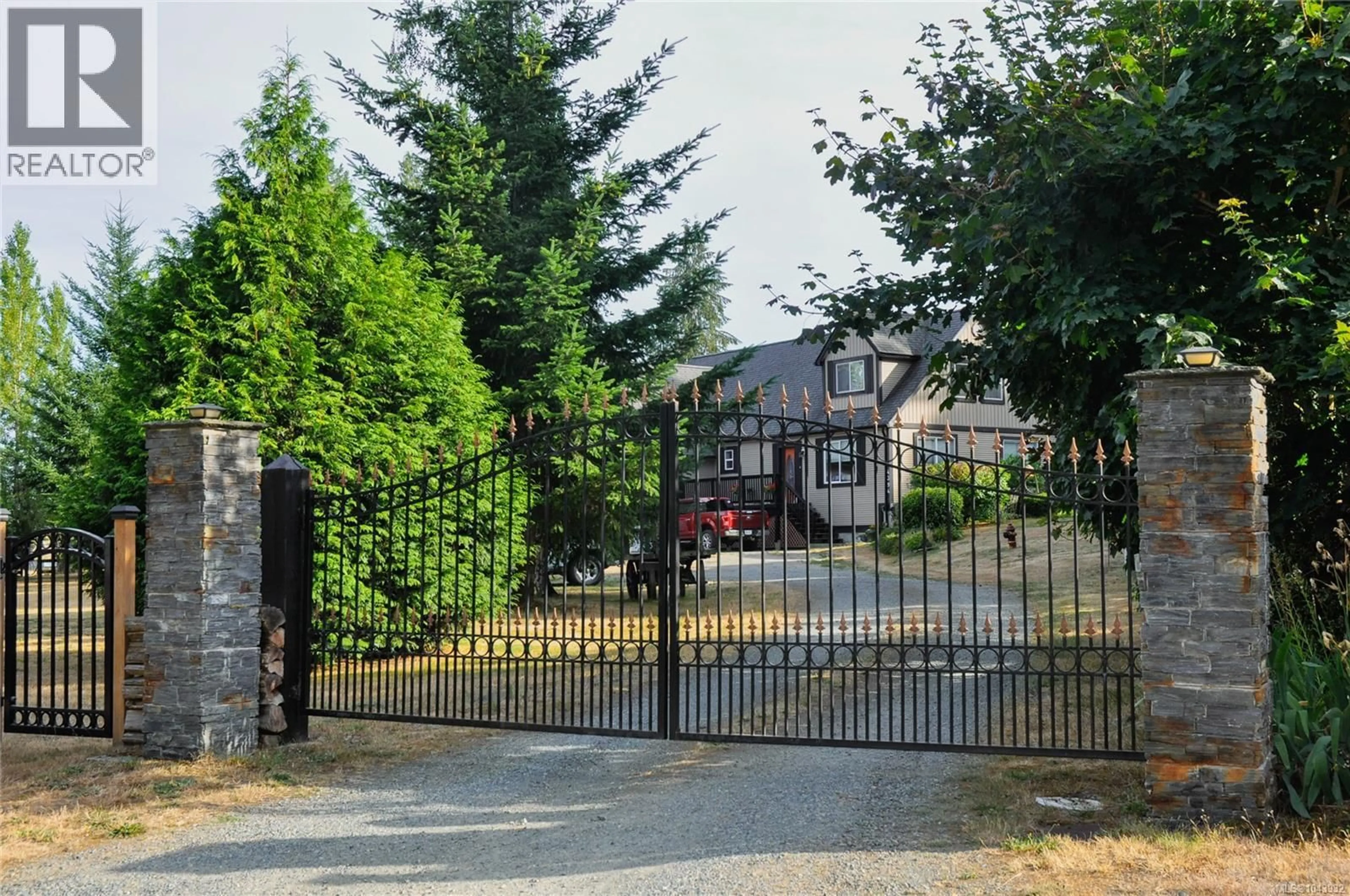 A pic from outside/outdoor area/front of a property/back of a property/a pic from drone, street for 4394 TELEGRAPH ROAD, Cowichan Bay British Columbia V0R1N2