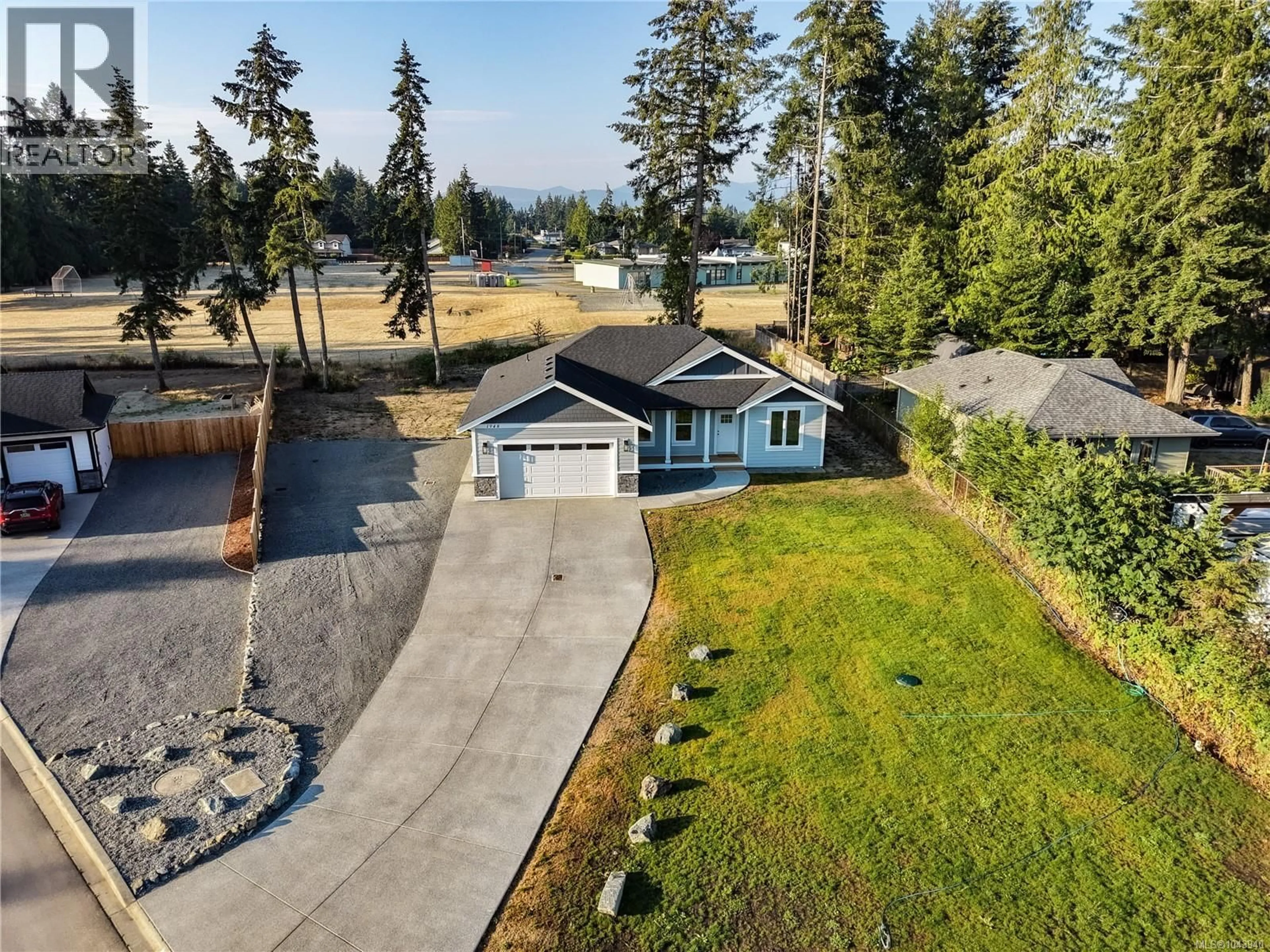 A pic from outside/outdoor area/front of a property/back of a property/a pic from drone, water/lake/river/ocean view for 1948 WOOBANK ROAD, Nanaimo British Columbia V9X1H4