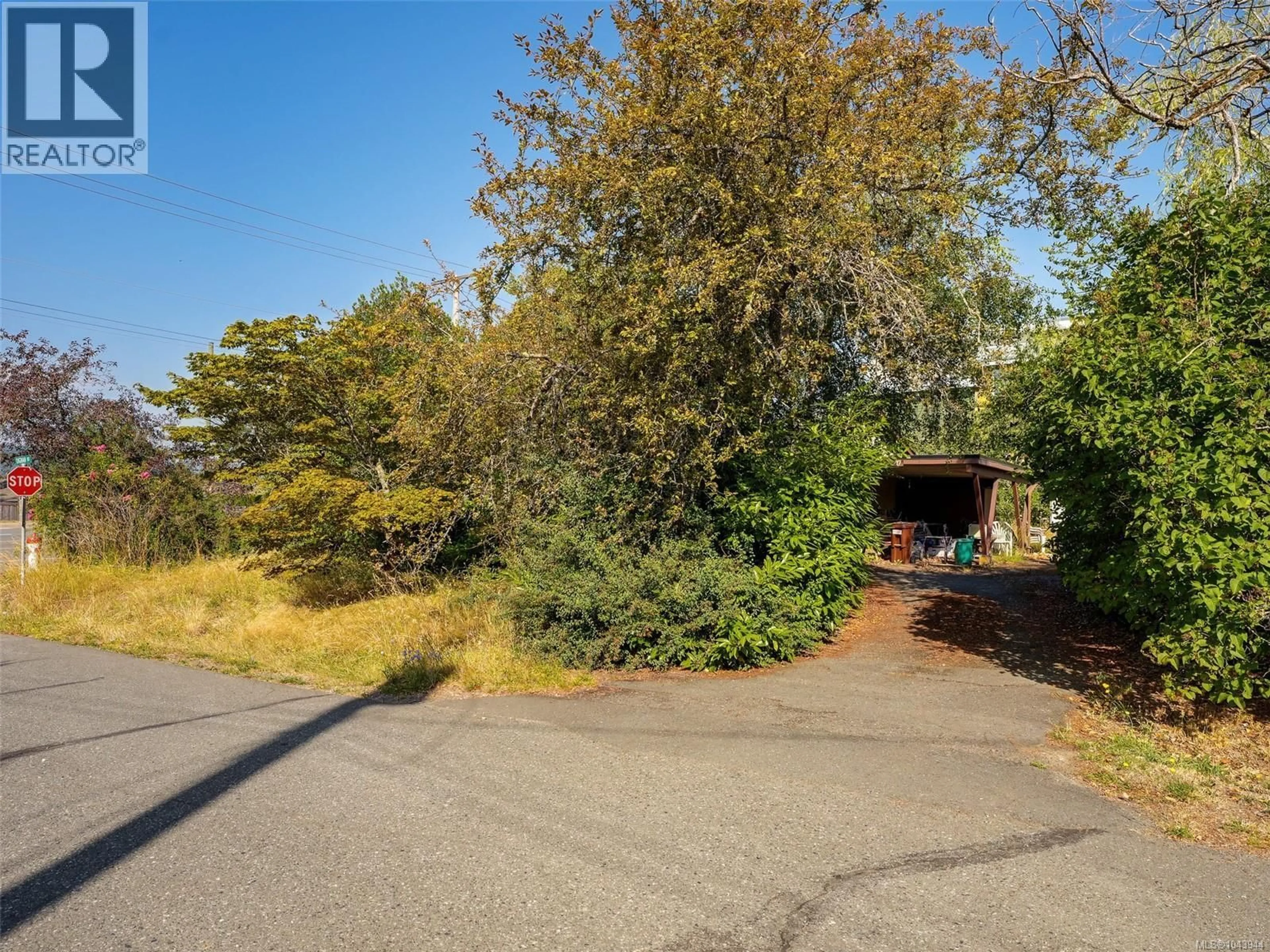 A pic from outside/outdoor area/front of a property/back of a property/a pic from drone, street for 1170 DIGNAN ROAD, Central Saanich British Columbia V8M1H4