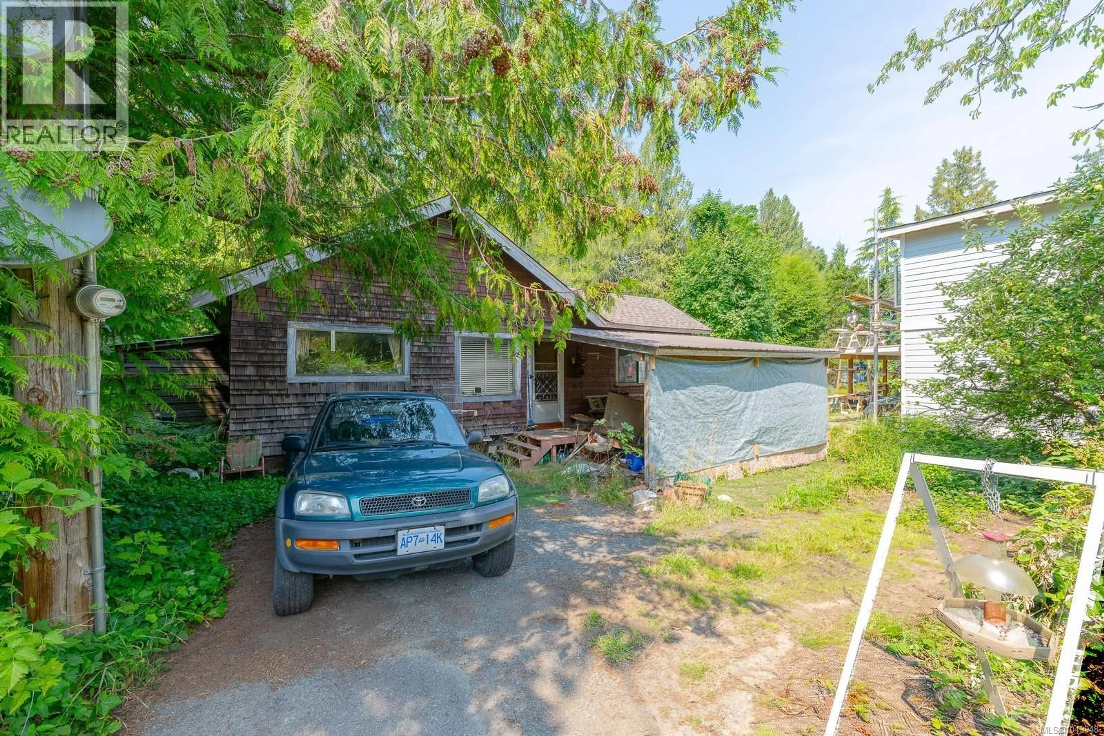 A pic from outside/outdoor area/front of a property/back of a property/a pic from drone, street for 1319 LEE ROAD, Parksville British Columbia V9P1Y9