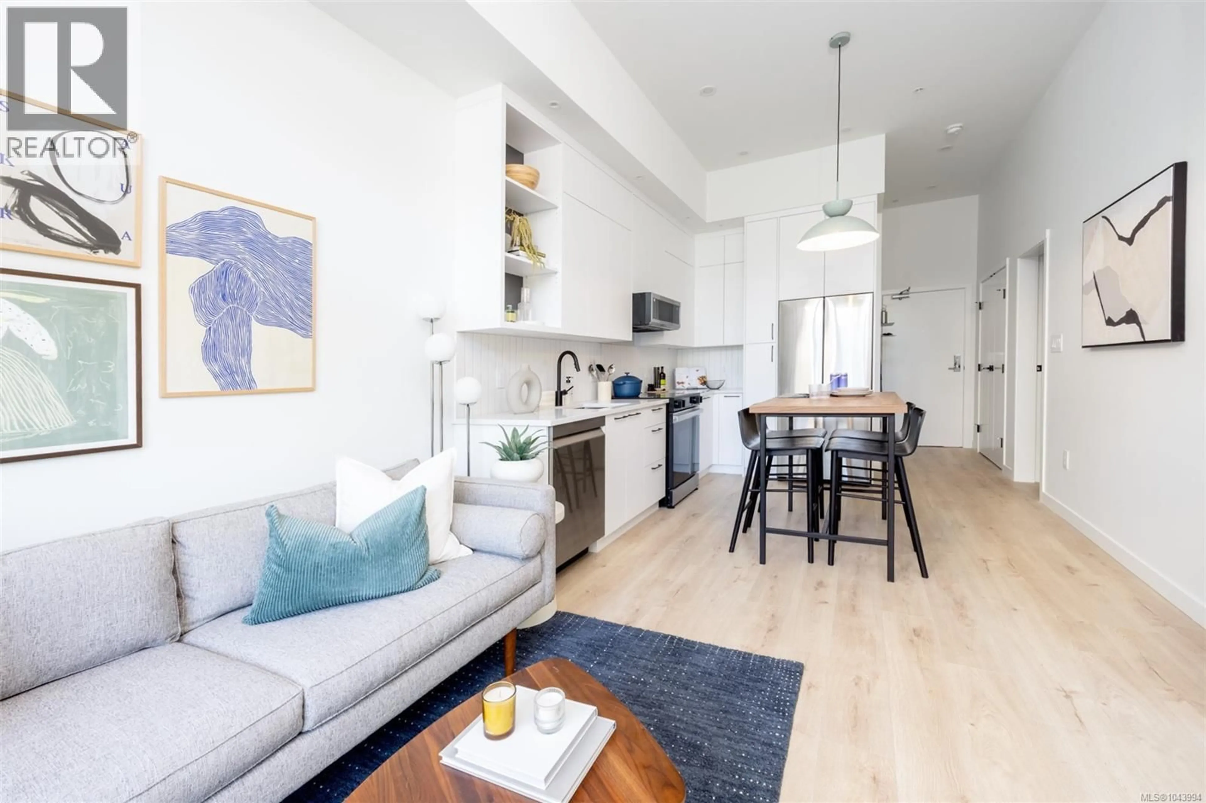 Open concept kitchen, wood/laminate floor for 201 - 1075 TILLICUM ROAD, Esquimalt British Columbia V9A2A4