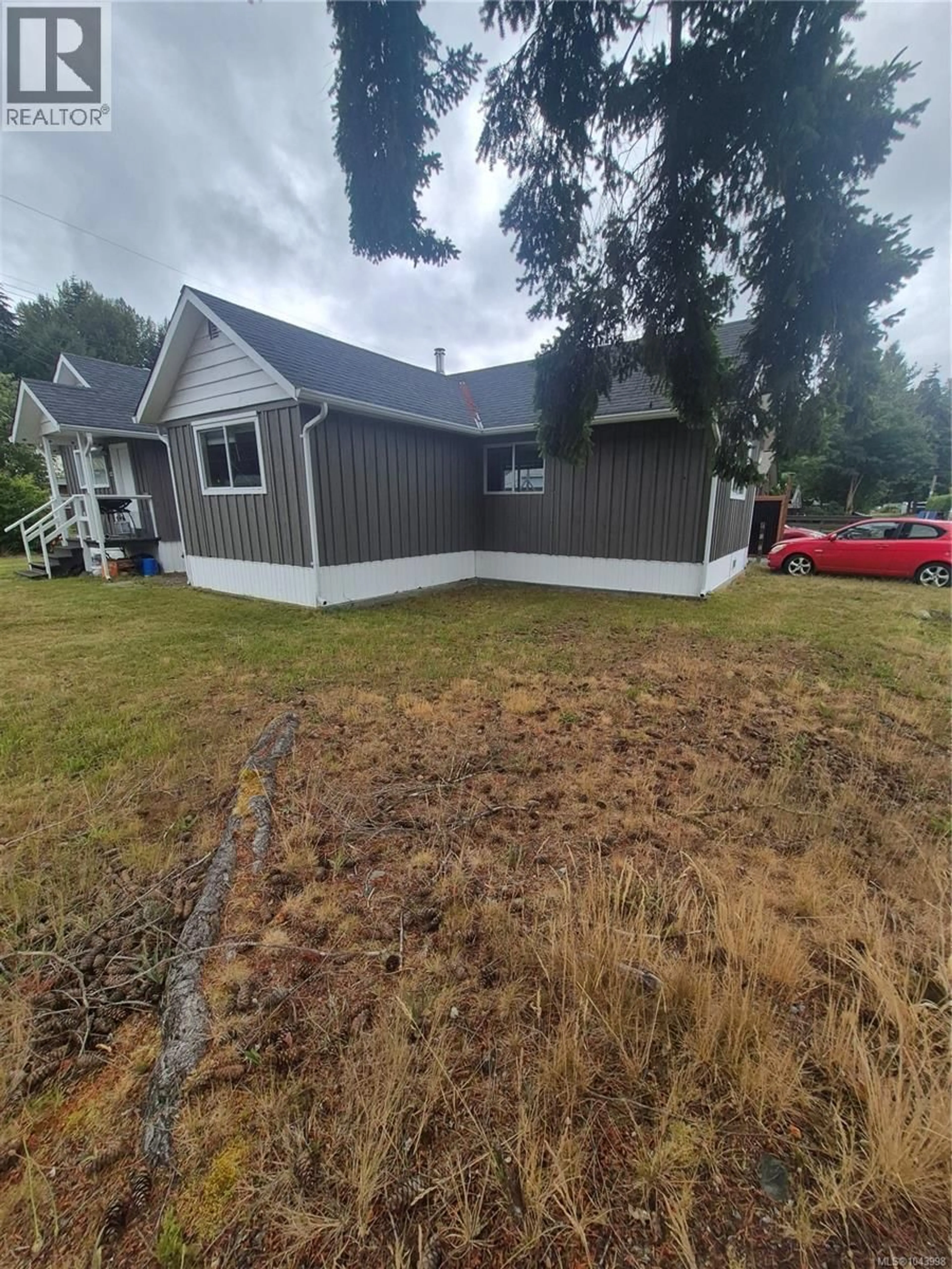 A pic from outside/outdoor area/front of a property/back of a property/a pic from drone, street for 46 PINDER AVENUE, Woss British Columbia V0N3P0